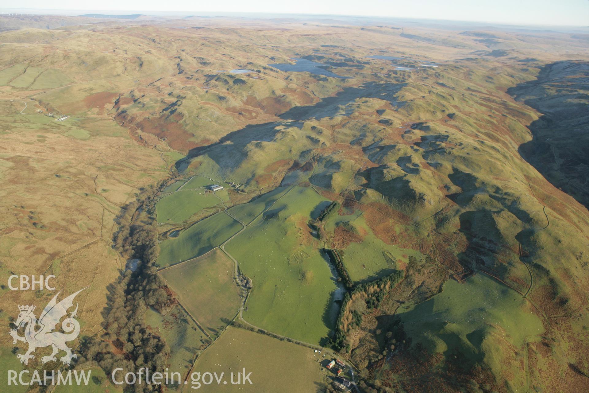 RCAHMW colour oblique photograph of the Troed y Rhiw landscape. Taken by Toby Driver on 20/12/2007.