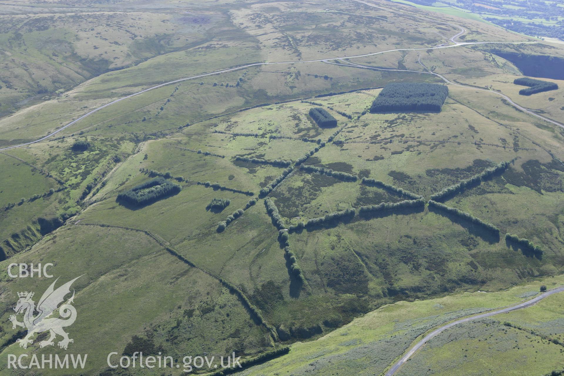 RCAHMW colour oblique aerial photograph of The Warren from the east. Taken on 08 August 2007 by Toby Driver