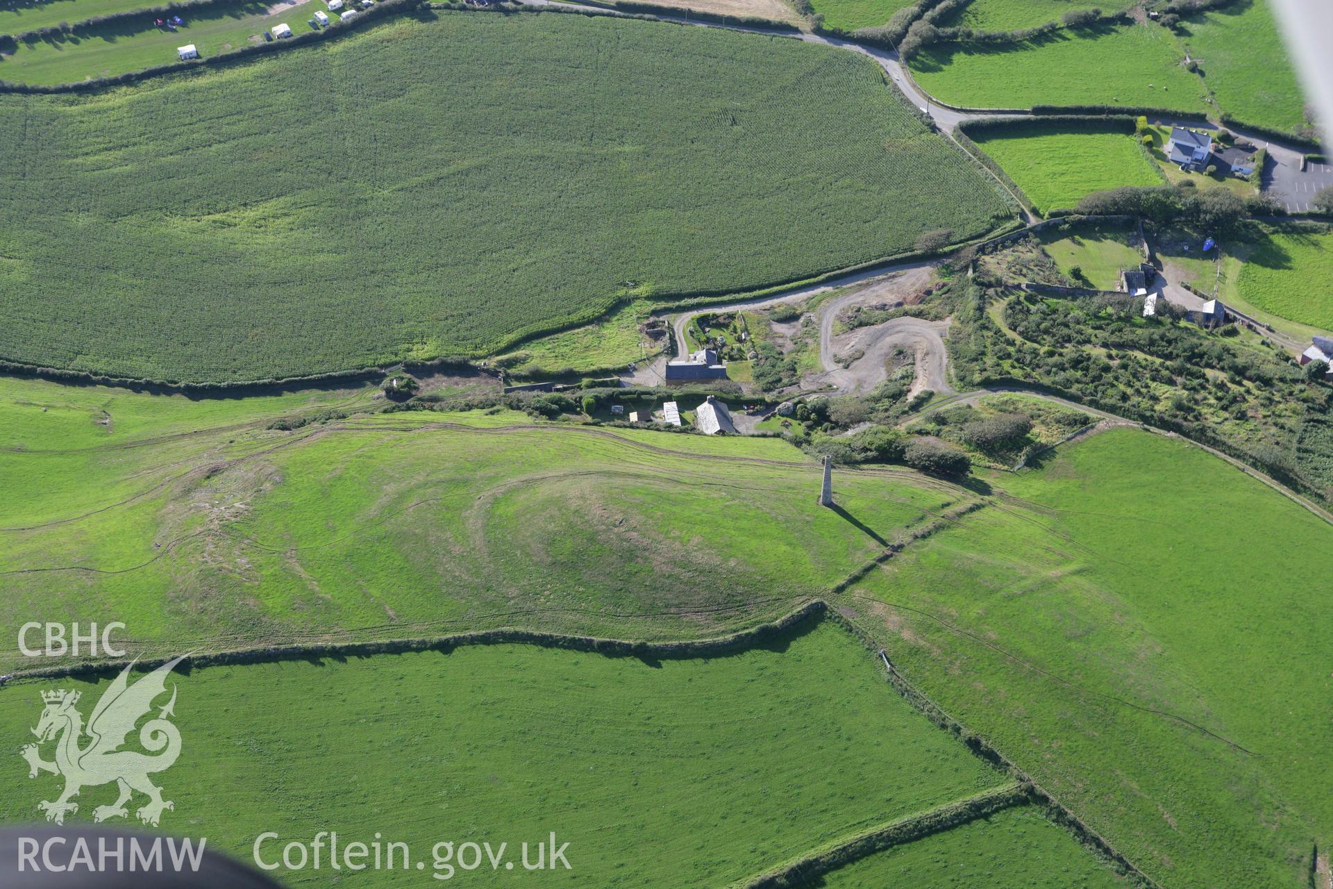 RCAHMW colour oblique aerial photograph of Pen-y-Gaer Defended Hillfort Enclosure. Taken on 06 September 2007 by Toby Driver