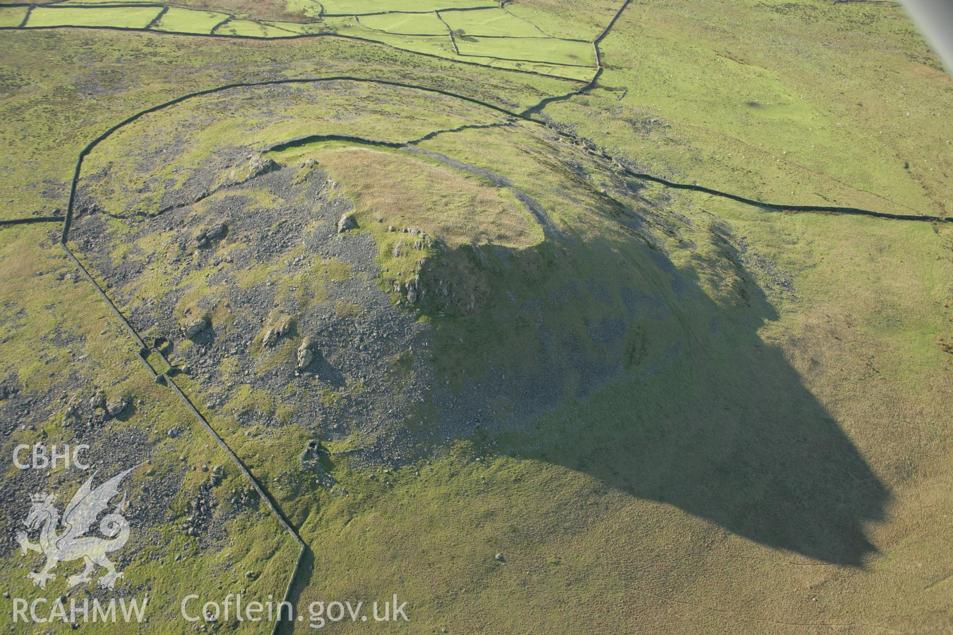 RCAHMW colour oblique aerial photograph of Pen-y-Gaer, with view of Camp. Taken on 25 January 2007 by Toby Driver