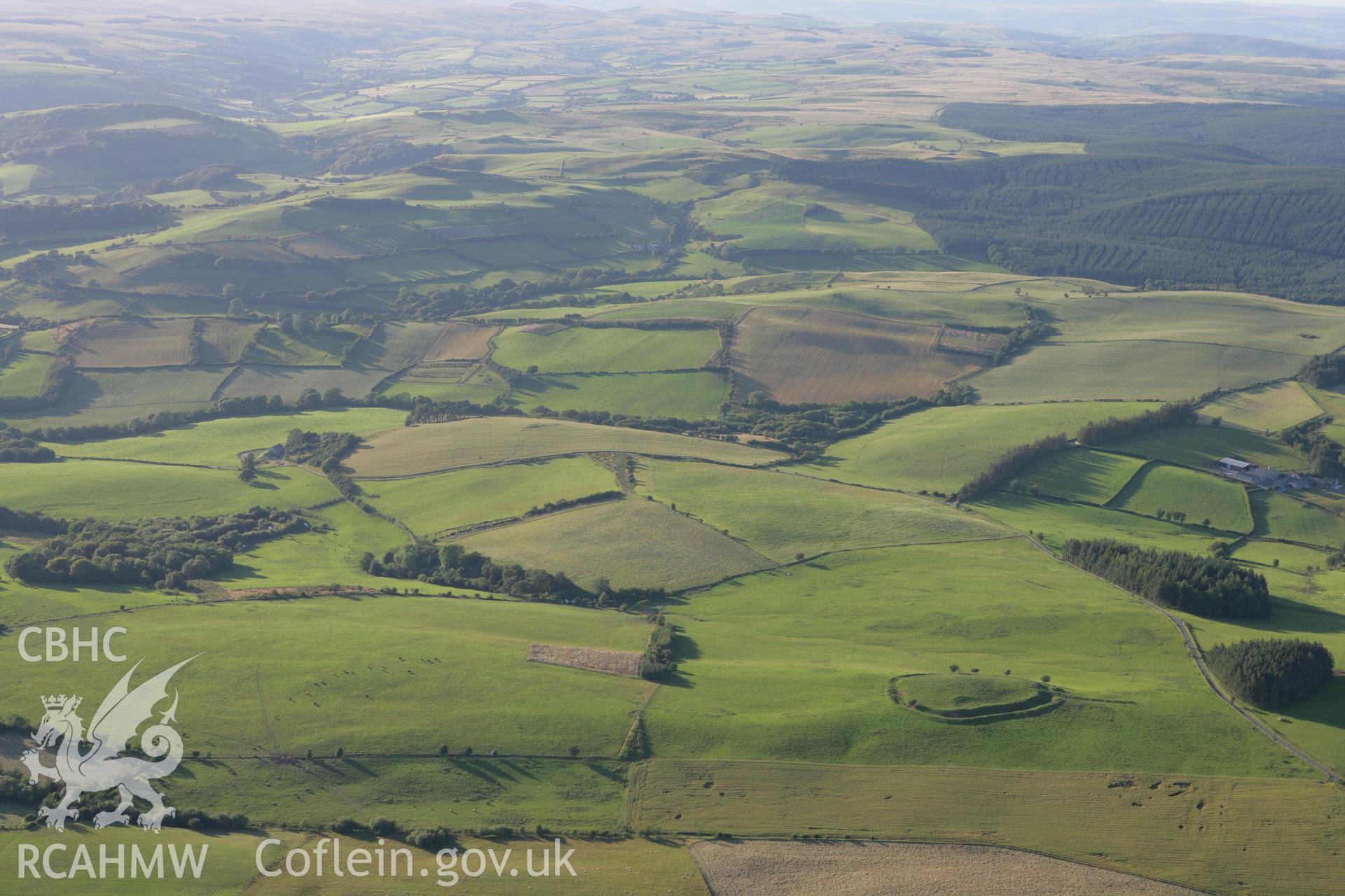 RCAHMW colour oblique aerial photograph of Twyn-y-Gaer. Taken on 08 August 2007 by Toby Driver