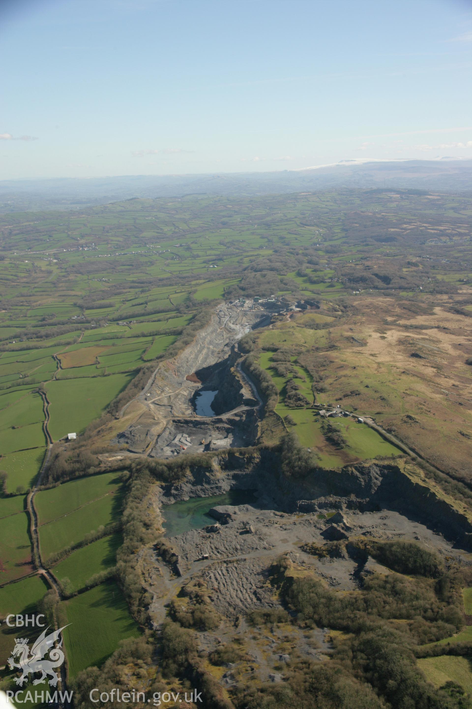 RCAHMW colour oblique aerial photograph of Mynydd Llangyndeyrn Cairn II. Taken on 21 March 2007 by Toby Driver