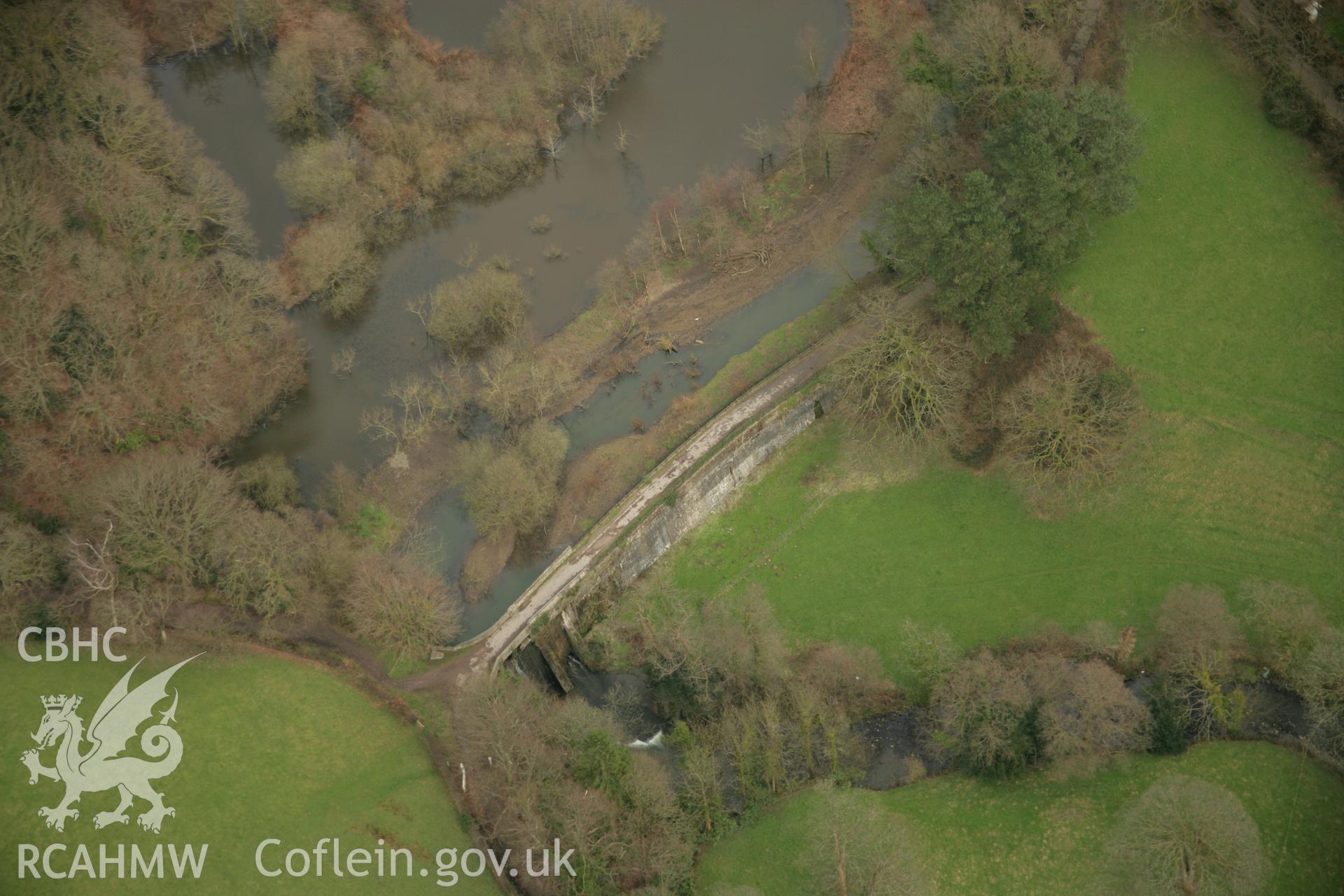 RCAHMW colour oblique aerial photograph of Afon Clydach Dam at Neath Abbey Ironworks. Taken on 16 March 2007 by Toby Driver