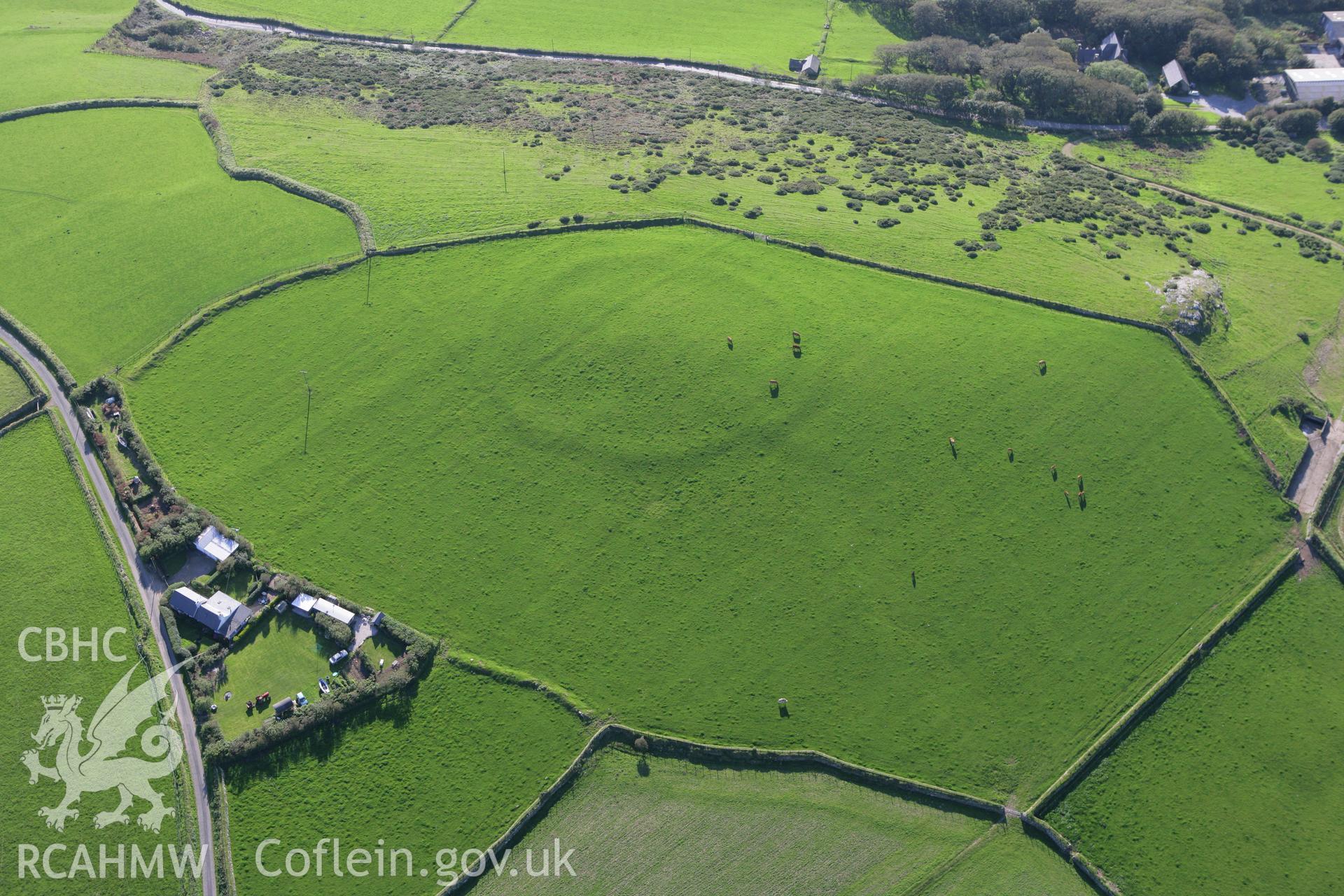 RCAHMW colour oblique aerial photograph of Meillionydd Enclosure. Taken on 06 September 2007 by Toby Driver