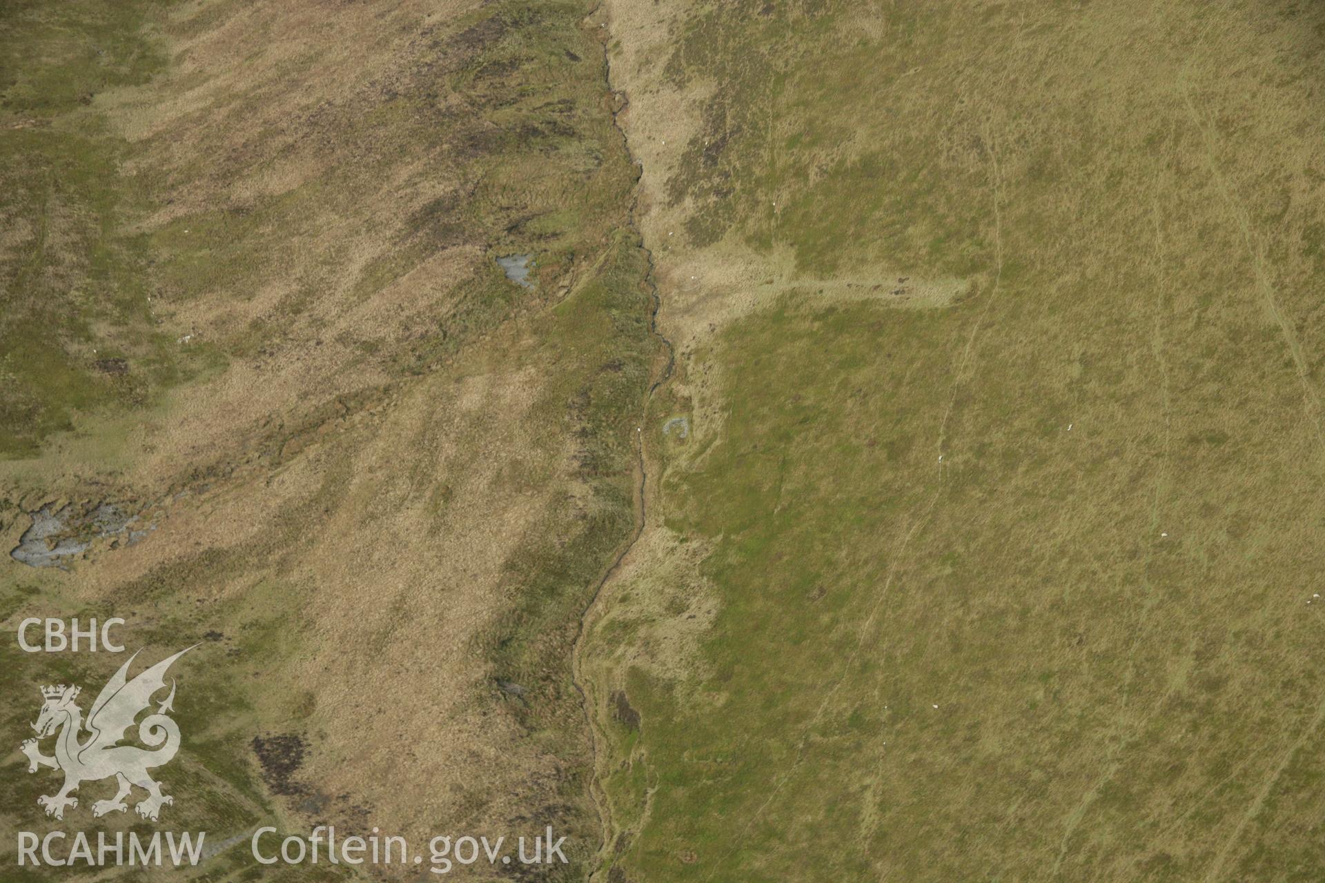 RCAHMW colour oblique aerial photograph of Nant Yr Helygen Deserted Rural Settlement. Taken on 17 April 2007 by Toby Driver