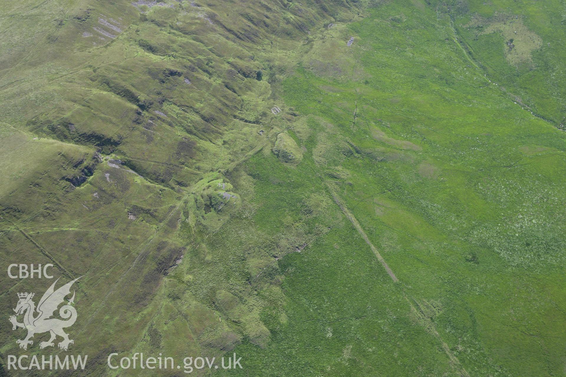 RCAHMW colour oblique aerial photograph of Padell-y-Bwlch Huts and Enclosures. Taken on 30 July 2007 by Toby Driver