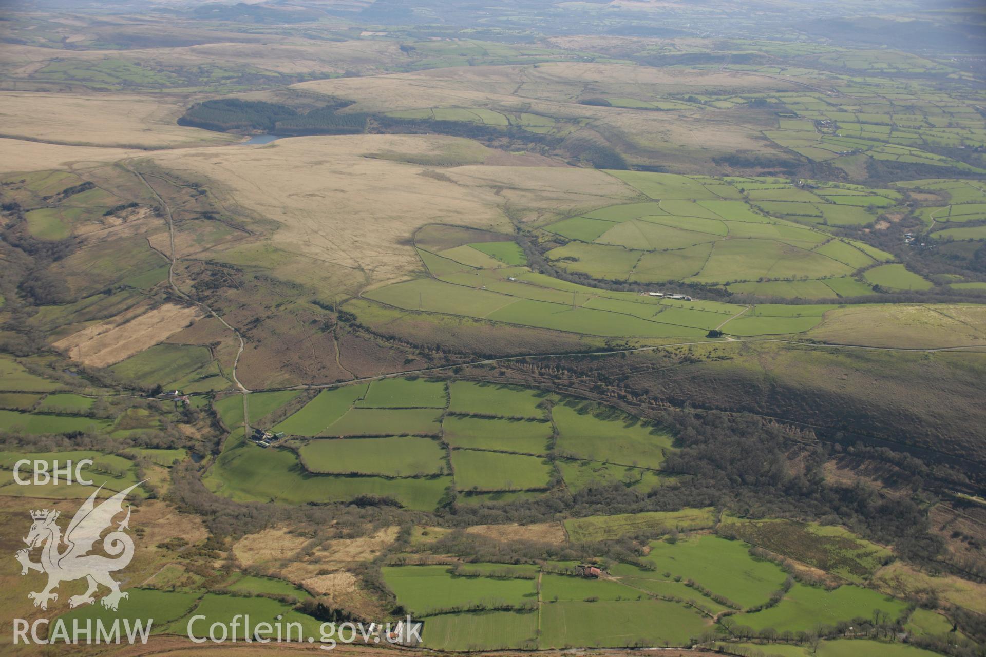 RCAHMW colour oblique aerial photograph of Mynydd Pysgodlyn Cairn. Taken on 21 March 2007 by Toby Driver