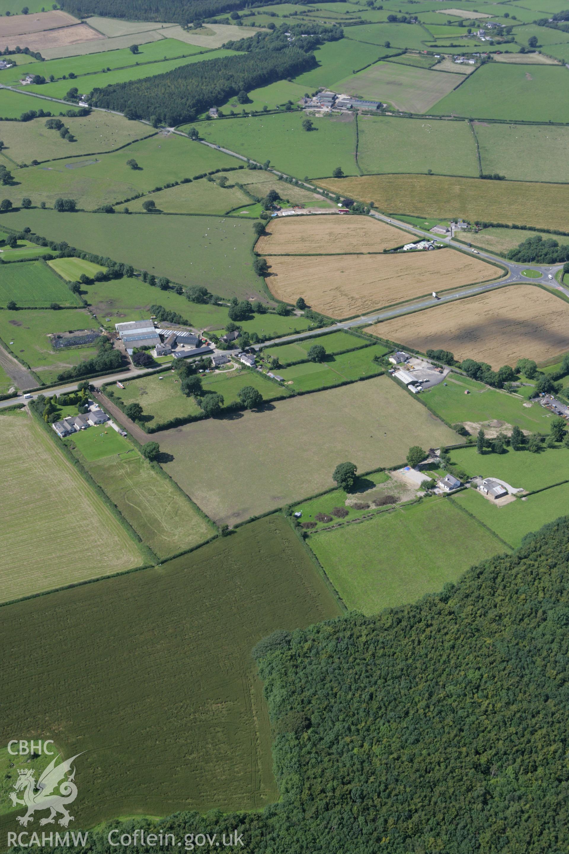 RCAHMW colour oblique aerial photograph of a section of Offa's Dyke or Whitford Dyke, from Rhydwen-Fach to Coed Pen-y-Gelli. Taken on 31 July 2007 by Toby Driver