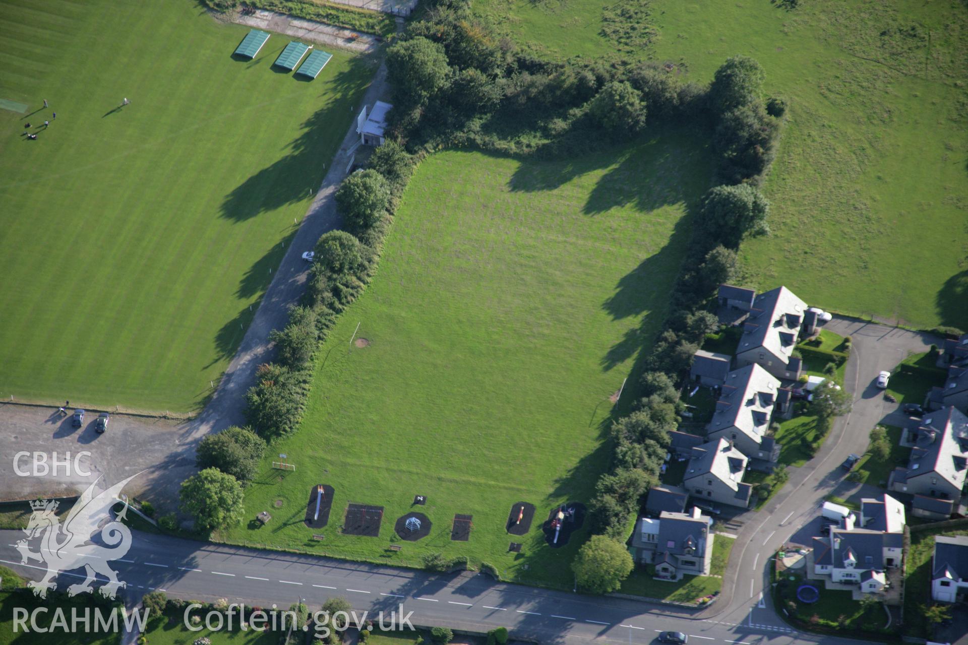 RCAHMW colour oblique aerial photograph of King George's Field Enclosure at Efailnewydd. Taken on 06 September 2007 by Toby Driver