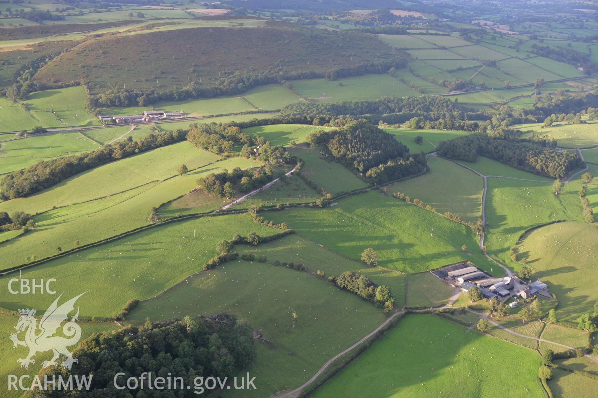 RCAHMW colour oblique aerial photograph of Pen-y-Foel Hillfort. Taken on 06 September 2007 by Toby Driver