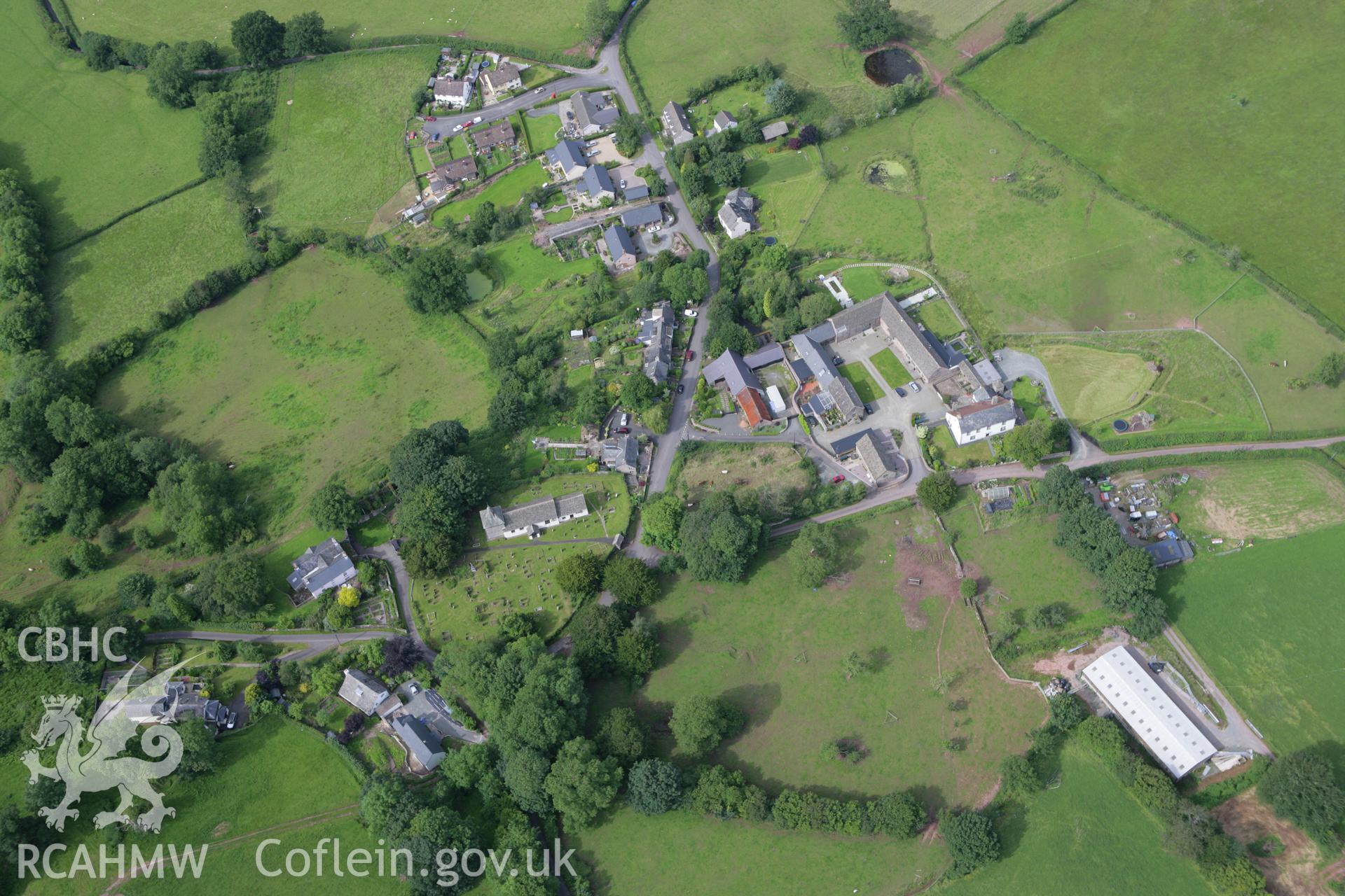 RCAHMW colour oblique aerial photograph of Llanfilo Moat II. Taken on 09 July 2007 by Toby Driver