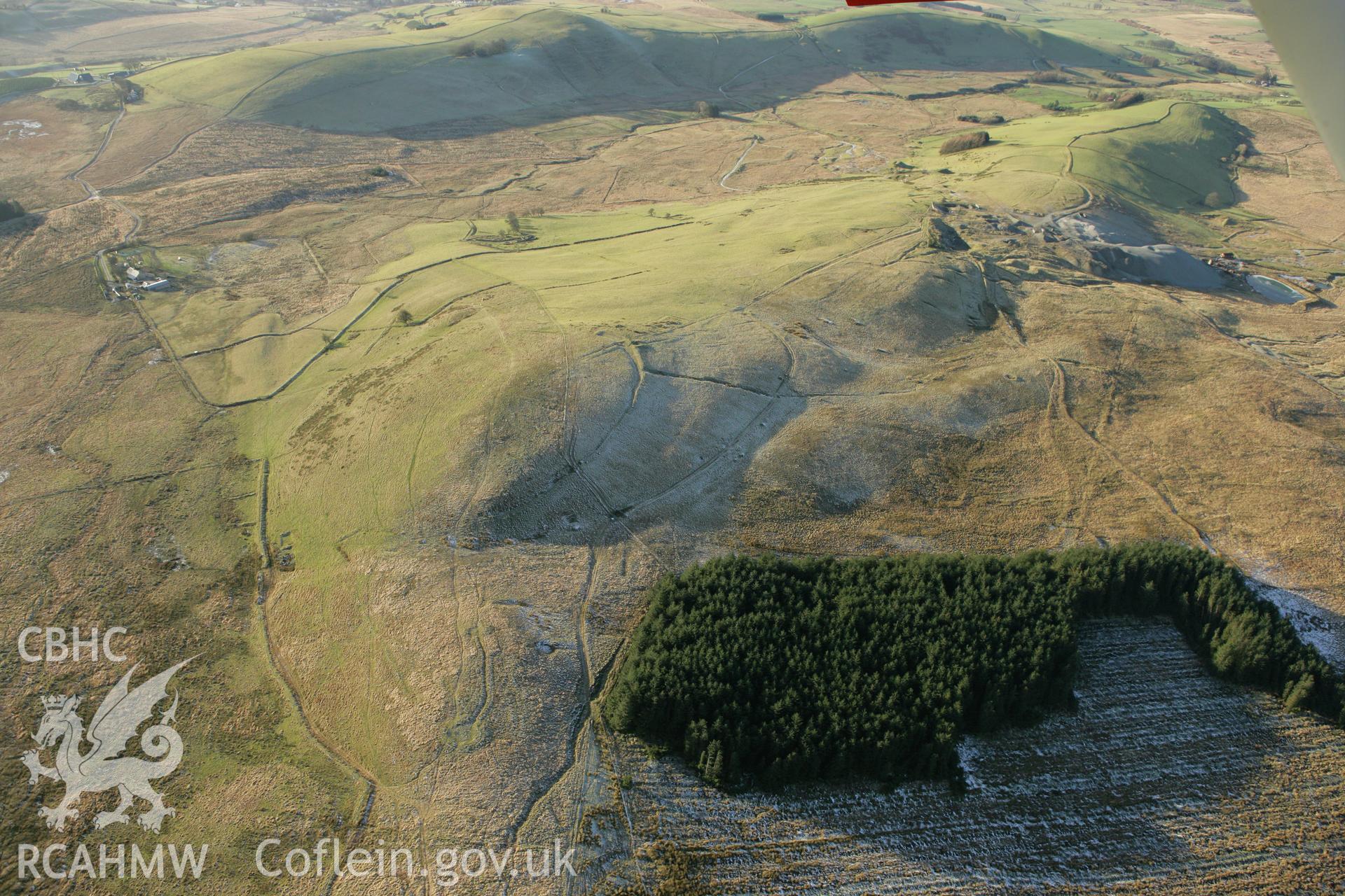 RCAHMW colour oblique photograph of the Esgairmwyn lead mine workings complex, from the west. Taken by Toby Driver on 20/12/2007.