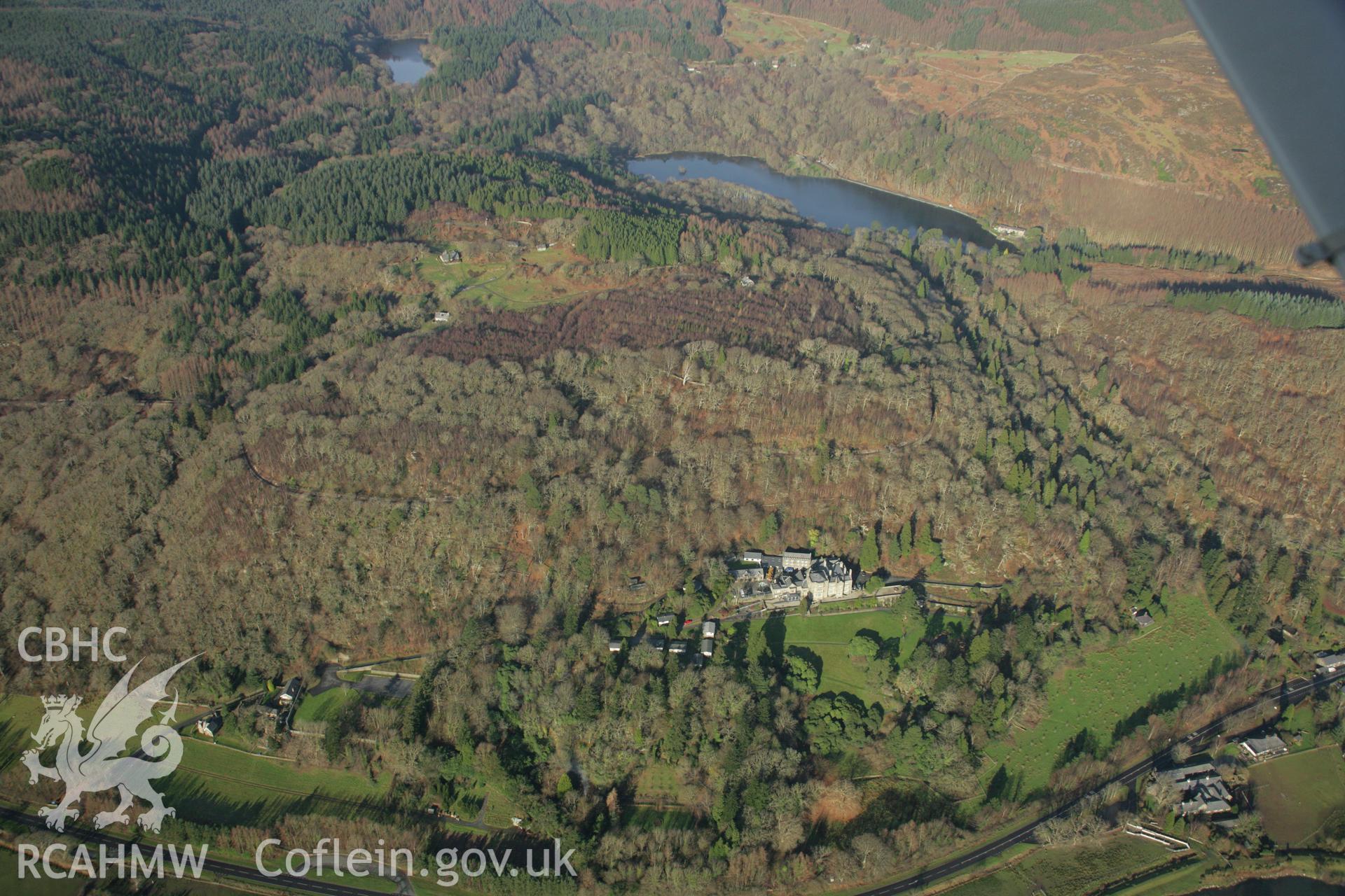 RCAHMW colour oblique aerial photograph of Plas Tan-y-Bwlch. A landscape view. Taken on 25 January 2007 by Toby Driver