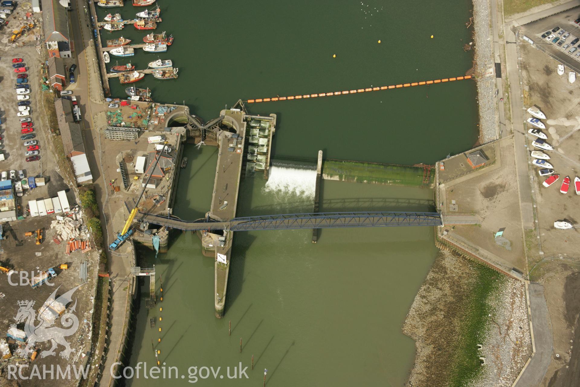 RCAHMW colour oblique aerial photograph of Swansea Dock Pilot House and the weir. Taken on 16 March 2007 by Toby Driver