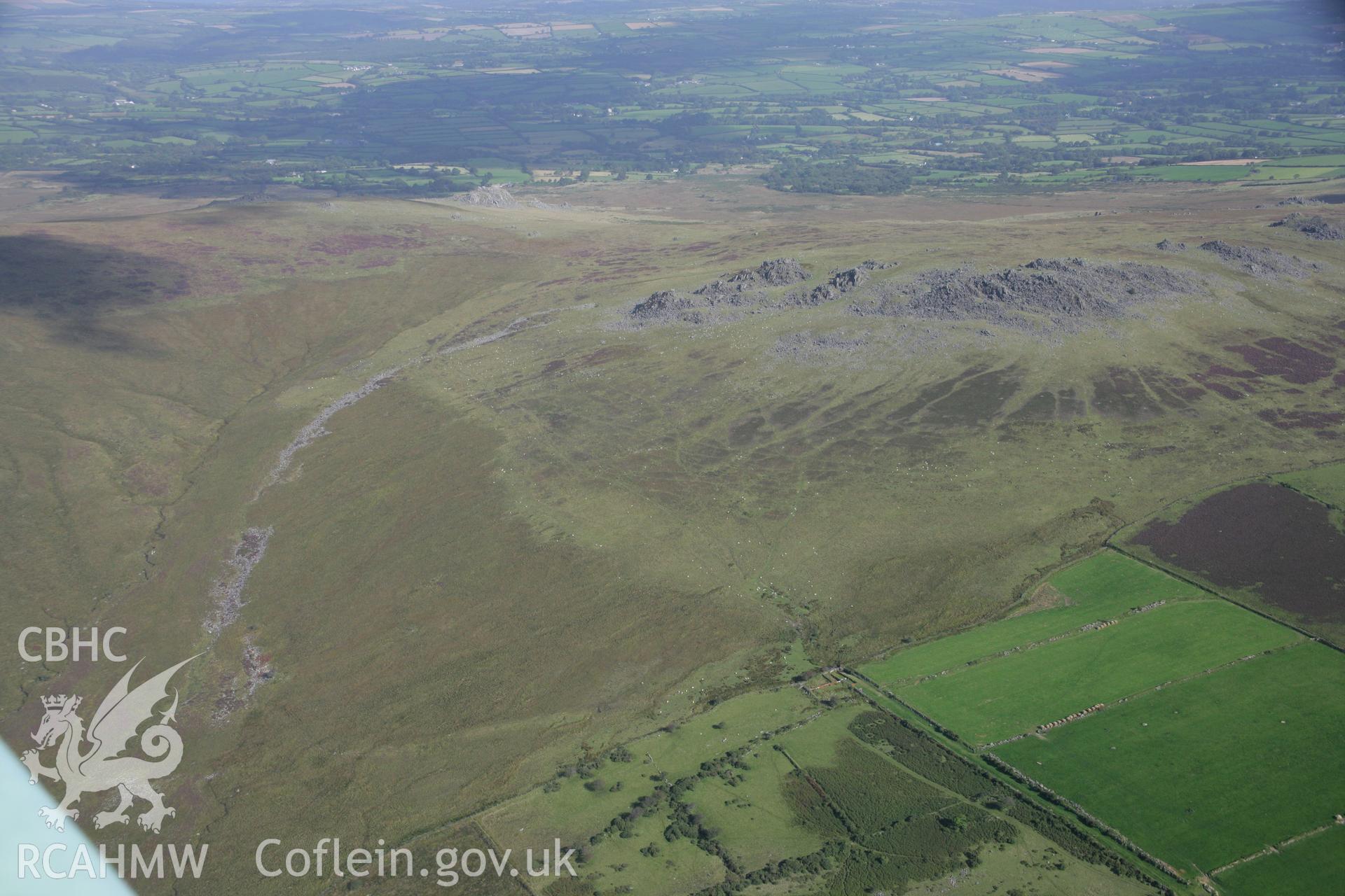 RCAHMW colour oblique photograph of Carn Menyn;Carn Meini, view from south-west. Taken by Toby Driver on 11/09/2007.