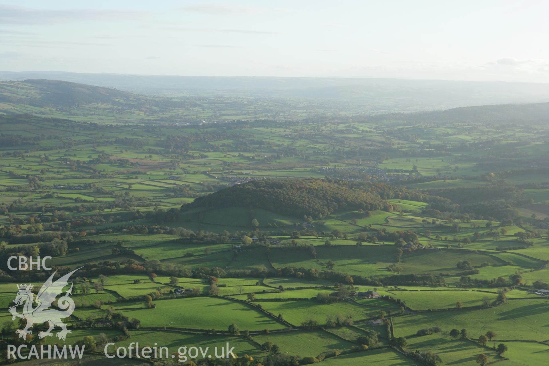 RCAHMW colour oblique photograph of Gaer Fawr hillfort, Guilsfield. Taken by Toby Driver on 30/10/2007.