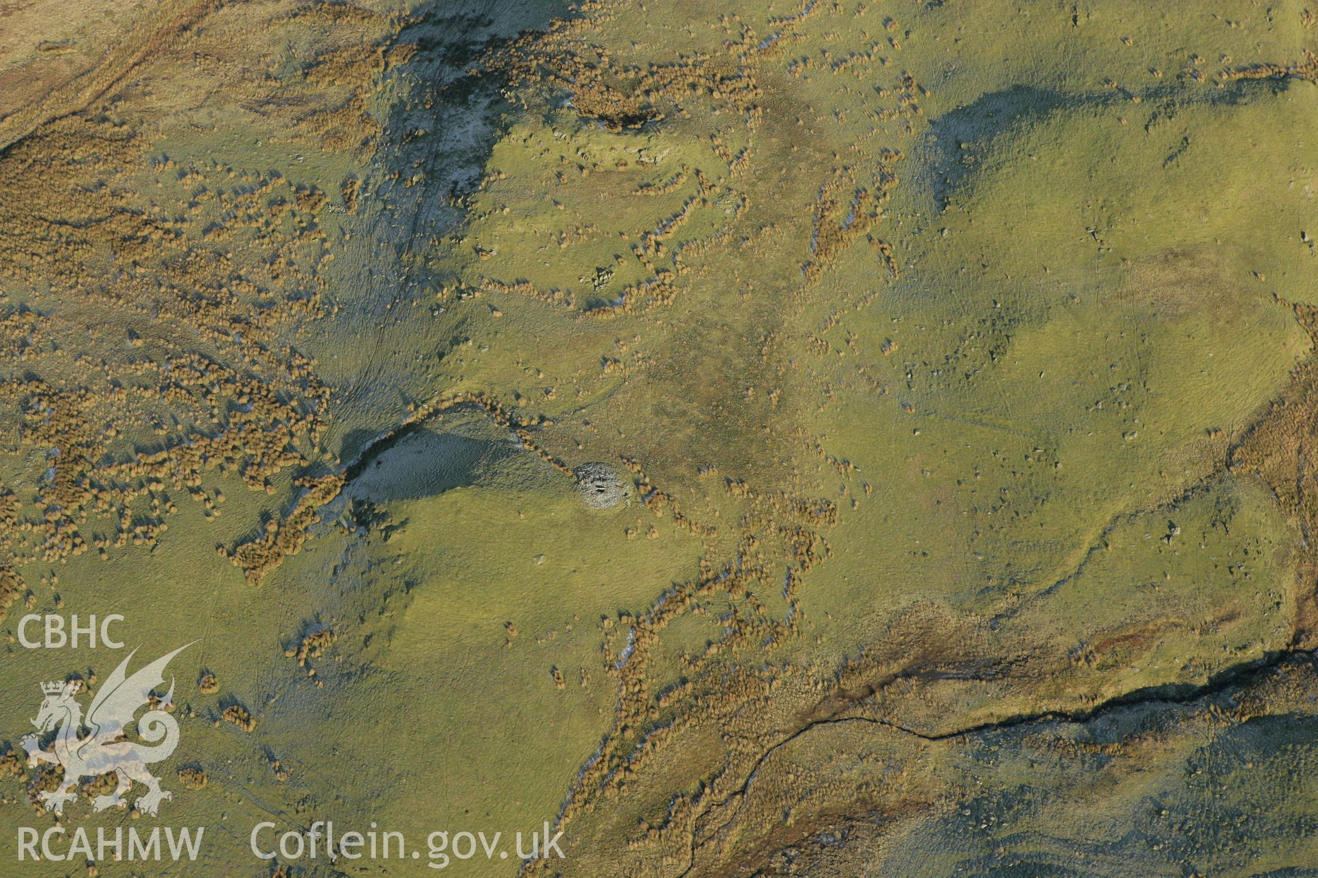 RCAHMW colour oblique photograph of Blaen Glasffrwd cairn III. Taken by Toby Driver on 20/12/2007.