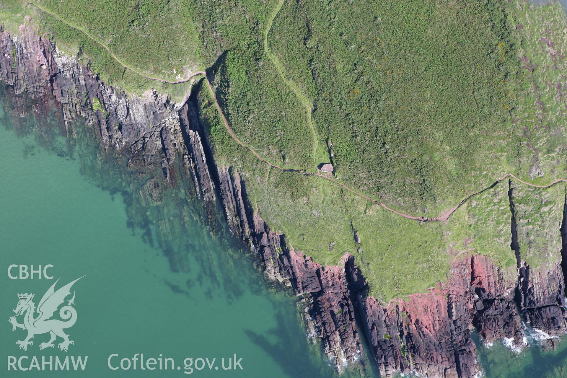 RCAHMW colour oblique aerial photograph of King's Quoit Burial Chamber. Taken on 30 July 2007 by Toby Driver