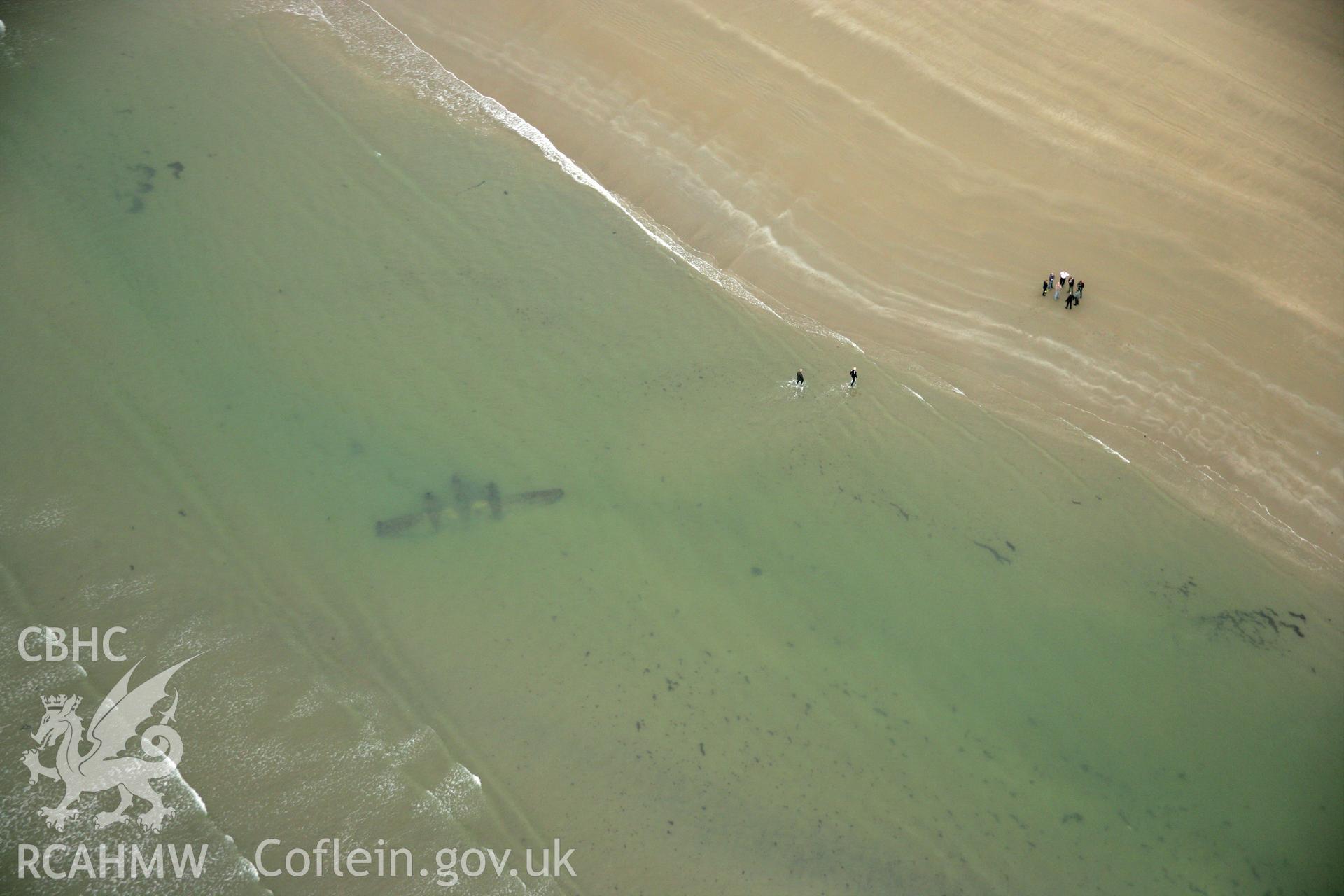 RCAHMW colour oblique photograph of P-38 Lightning, aircraft wreck at low tide. Taken by Toby Driver on 08/10/2007.