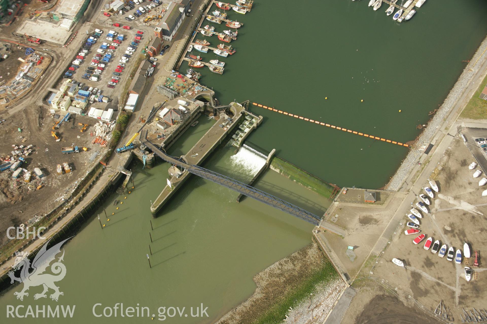 RCAHMW colour oblique aerial photograph of Swansea Dock Pilot House and the weir. Taken on 16 March 2007 by Toby Driver