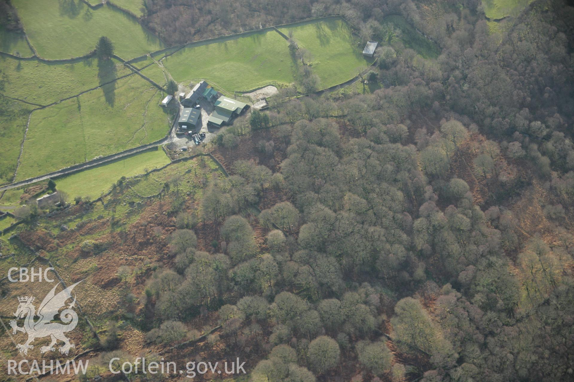 RCAHMW colour oblique aerial photograph of an enclosed hut group at Nurse Cae Du. Taken on 25 January 2007 by Toby Driver