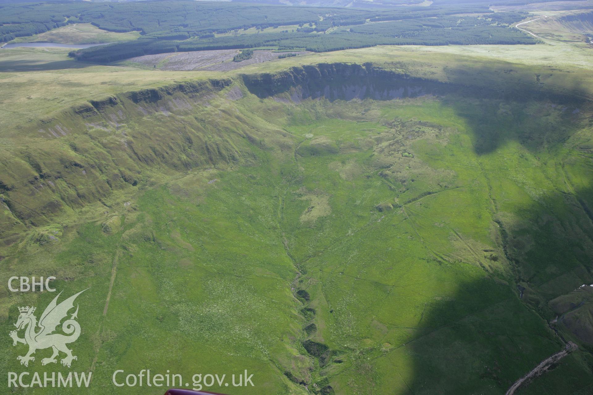 RCAHMW colour oblique aerial photograph of Padell-y-Bwlch Huts and Enclosures. Taken on 30 July 2007 by Toby Driver