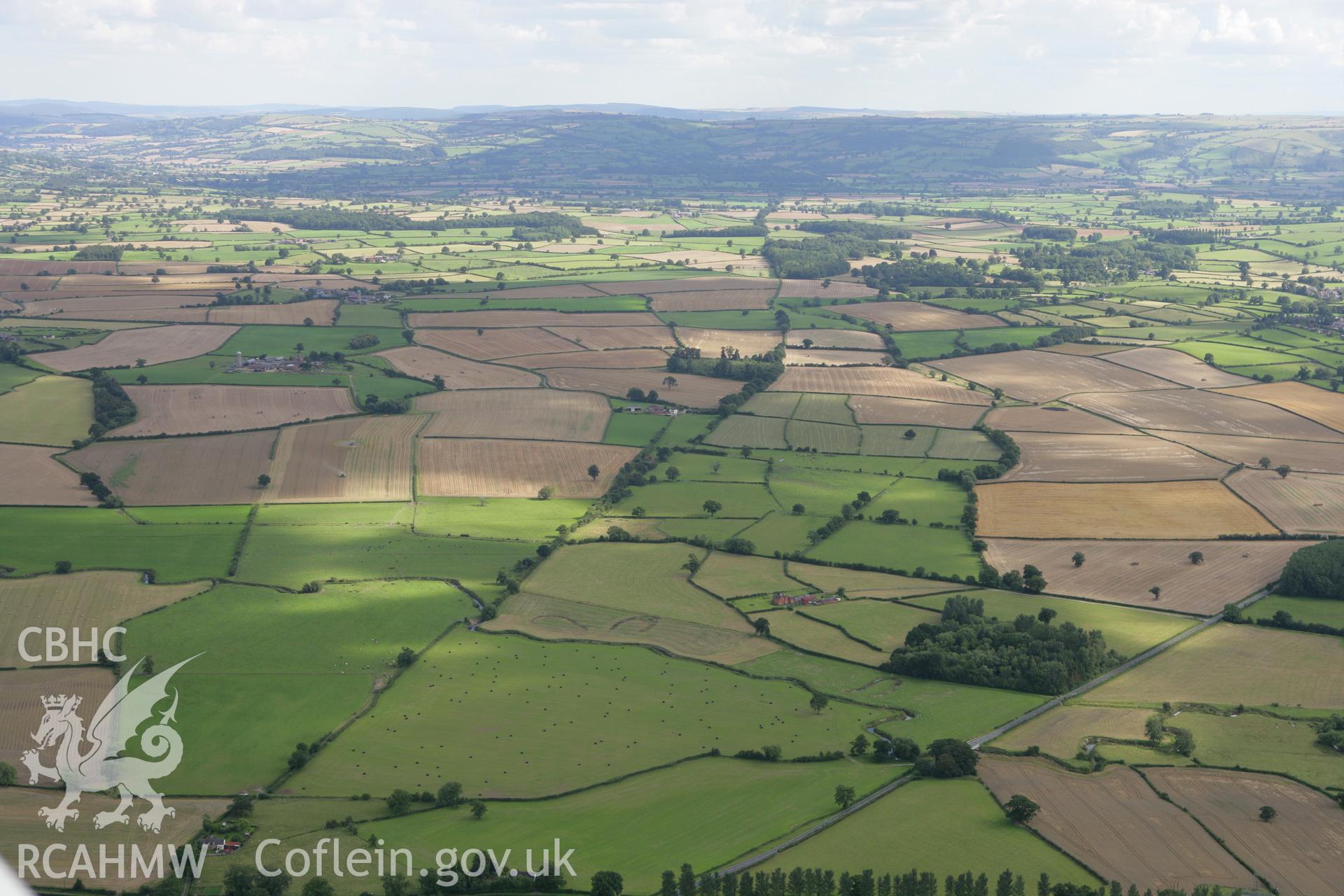 RCAHMW colour oblique aerial photograph of a section of Offa's Dyke near Montgomery. Taken on 08 August 2007 by Toby Driver