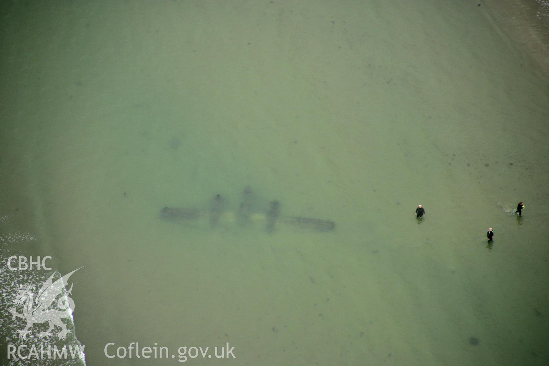 RCAHMW colour oblique photograph of P-38 Lightning, aircraft wreck at low tide. Taken by Toby Driver on 08/10/2007.