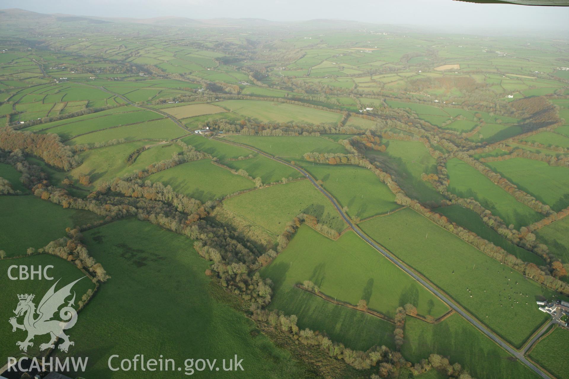 RCAHMW colour oblique photograph of Brechfa;concentric cropmark enclosure North-West of. Taken by Toby Driver on 06/11/2007.