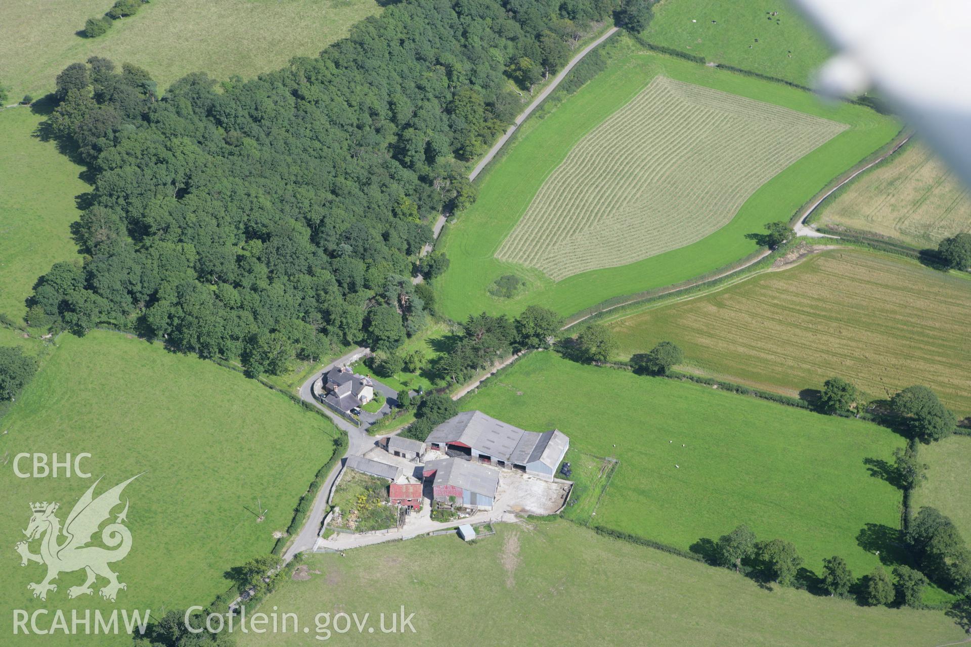 RCAHMW colour oblique aerial photograph of Tyddyn Bleiddyn Burial Chamber. Taken on 31 July 2007 by Toby Driver