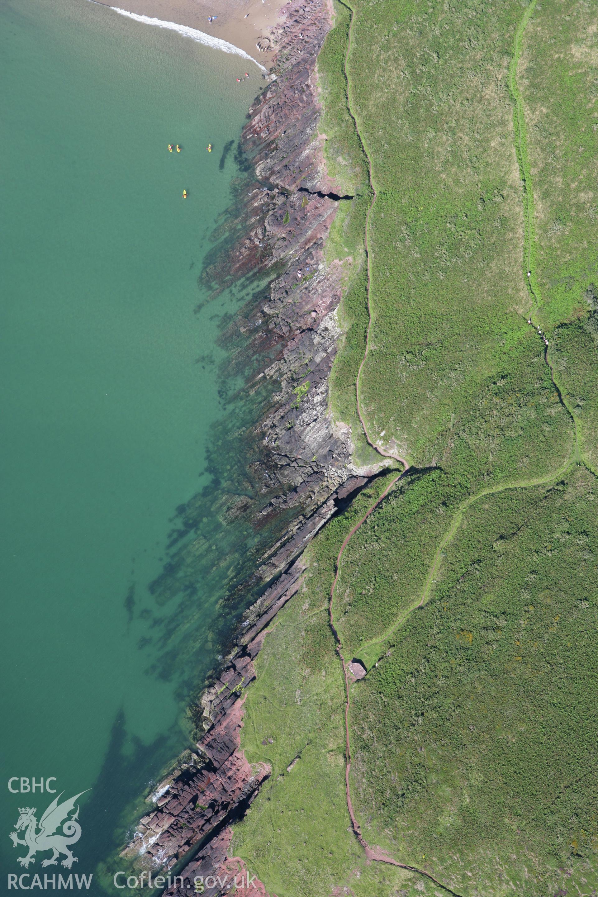 RCAHMW colour oblique aerial photograph of King's Quoit Burial Chamber. Taken on 30 July 2007 by Toby Driver