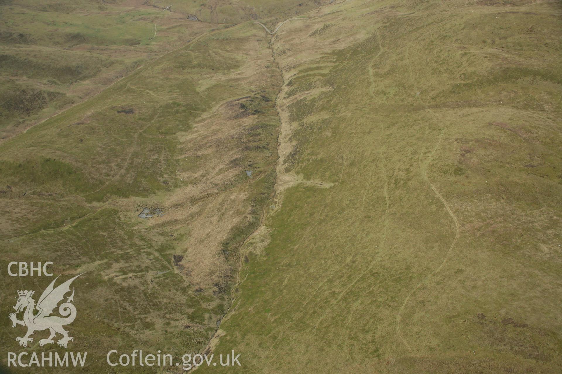 RCAHMW colour oblique aerial photograph of Nant Yr Helygen Deserted Rural Settlement. Taken on 17 April 2007 by Toby Driver