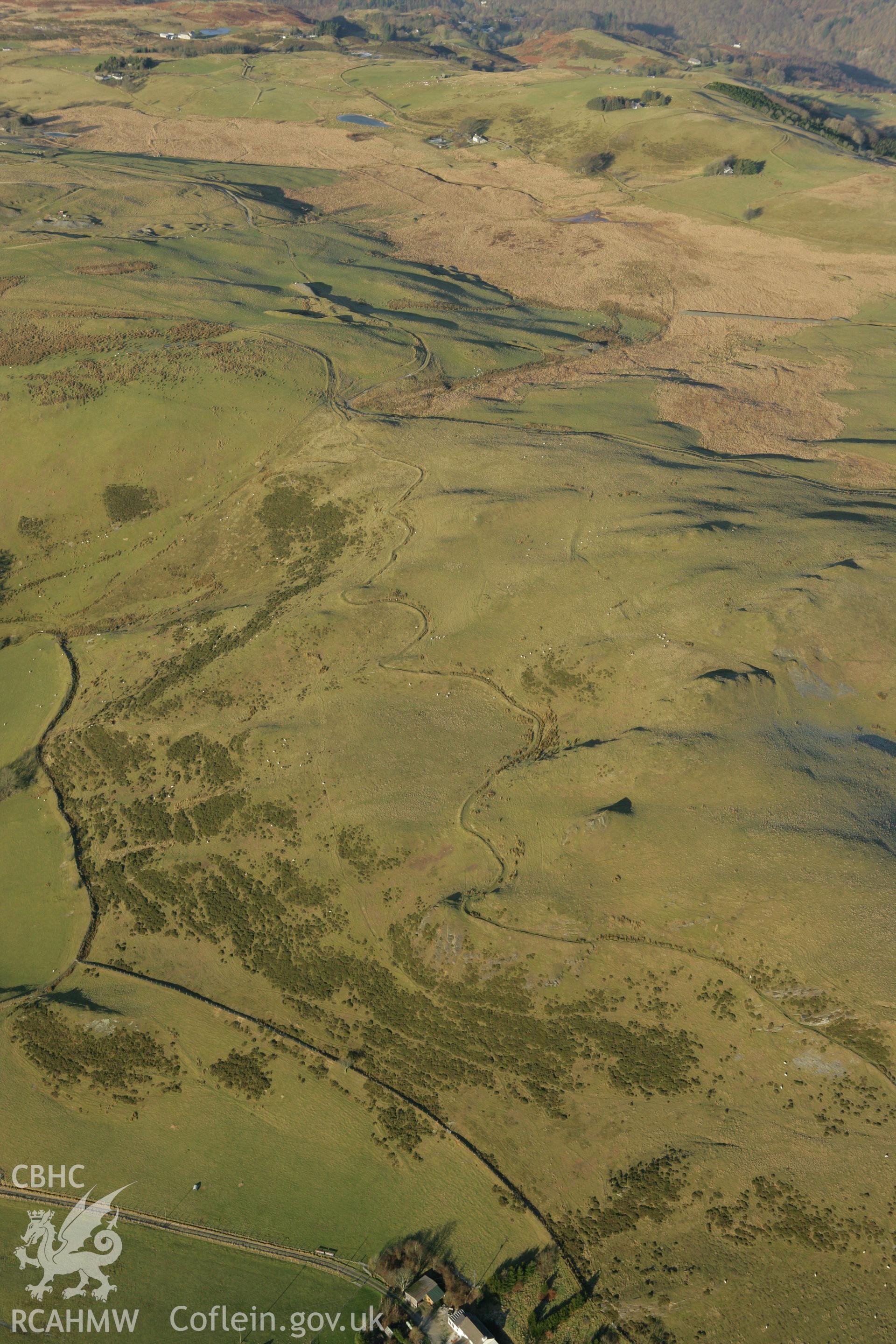 RCAHMW colour oblique photograph of Glogfach Mine showing contour leat to the east. Taken by Toby Driver on 20/12/2007.