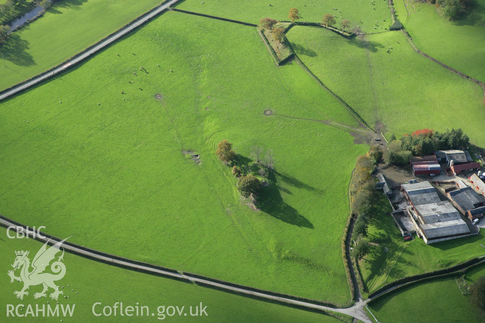 RCAHMW colour oblique photograph of Llyssun Castle, motte and bailey. Taken by Toby Driver on 30/10/2007.