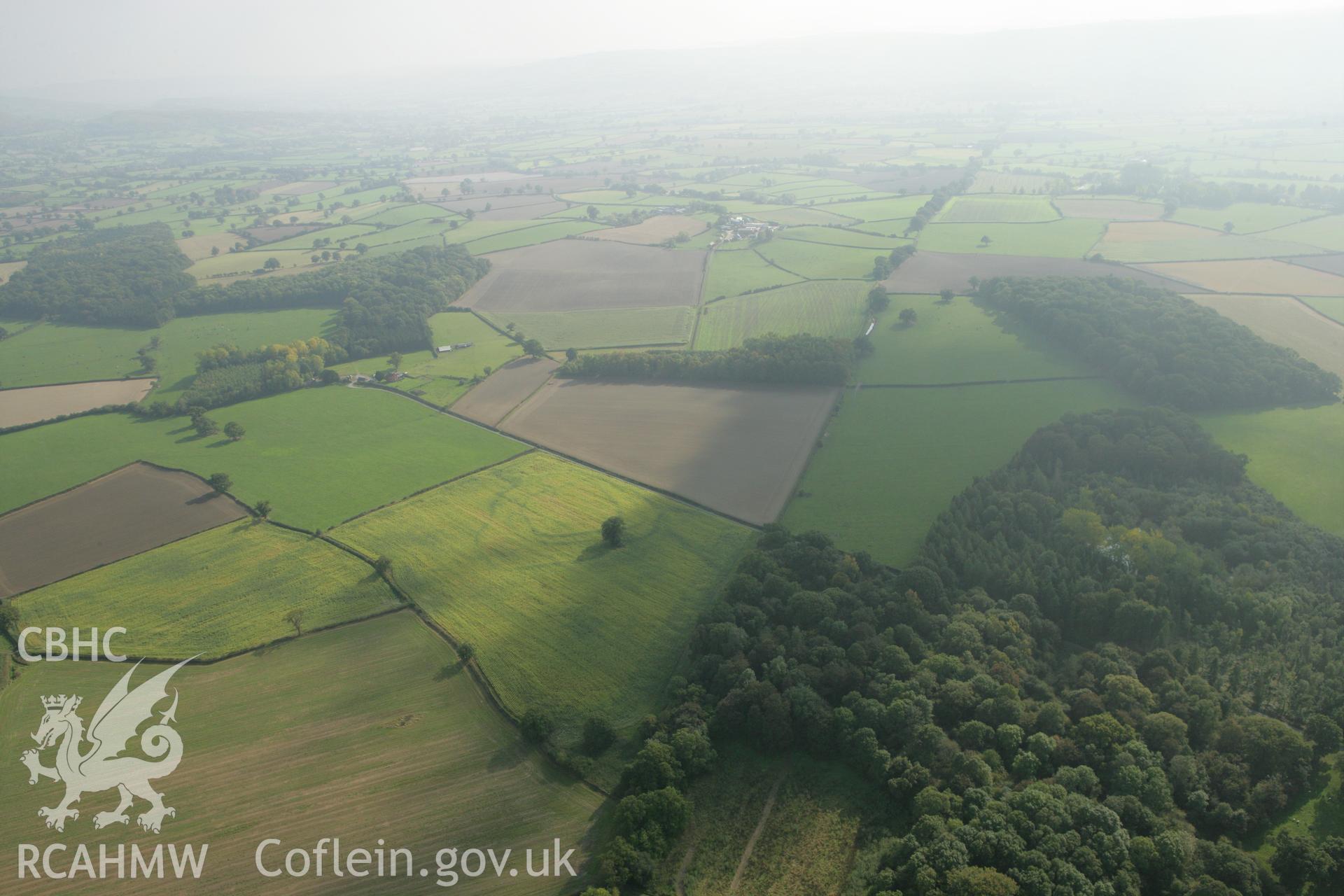 RCAHMW colour oblique photograph of Lymore Park, defended enclosure cropmark, in ENGLAND. Taken by Toby Driver on 08/10/2007.