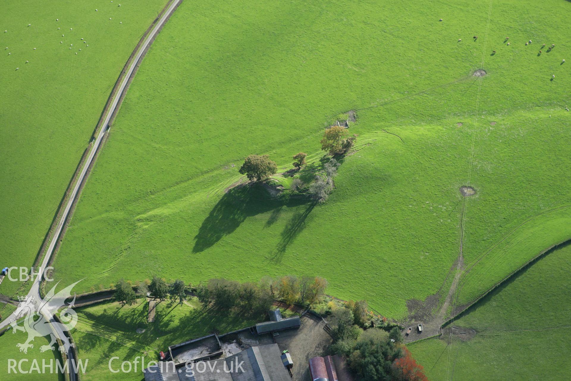 RCAHMW colour oblique photograph of Llyssun Castle, motte and bailey. Taken by Toby Driver on 30/10/2007.