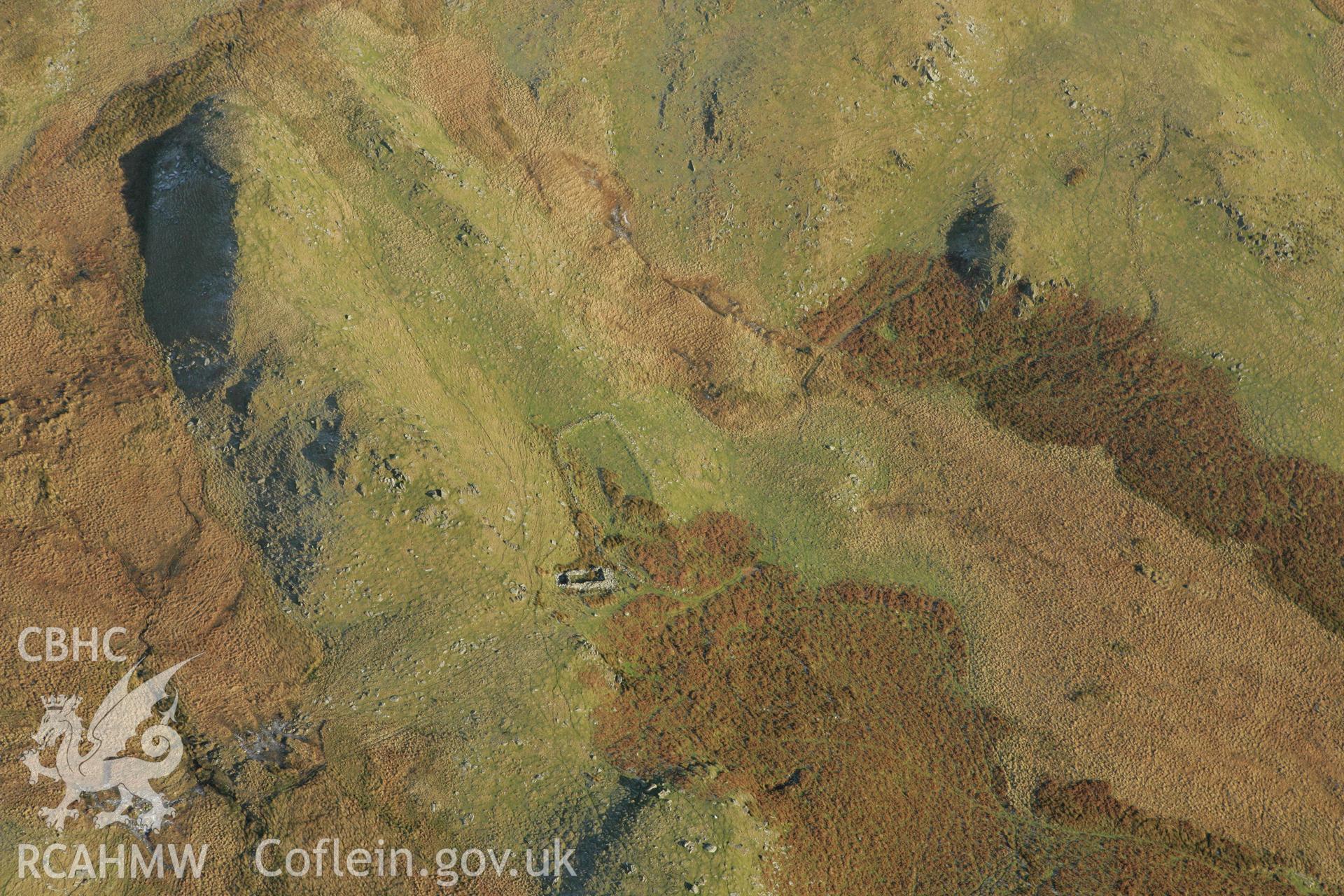 RCAHMW colour oblique photograph of Hafod Ffrith, showing hafod and sheepfold. Taken by Toby Driver on 20/12/2007.