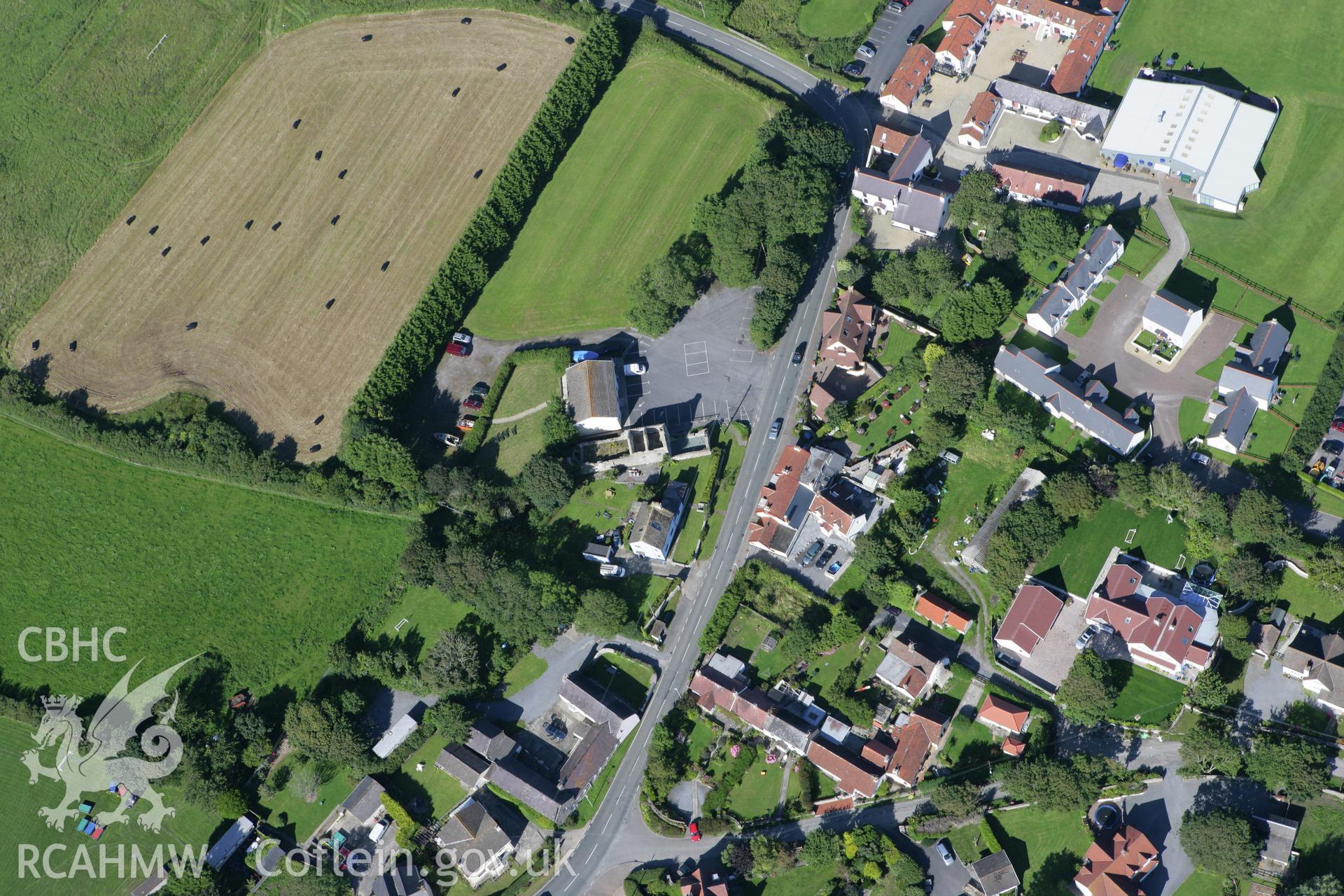 RCAHMW colour oblique aerial photograph of The Old Palace, Lydstep. Taken on 30 July 2007 by Toby Driver