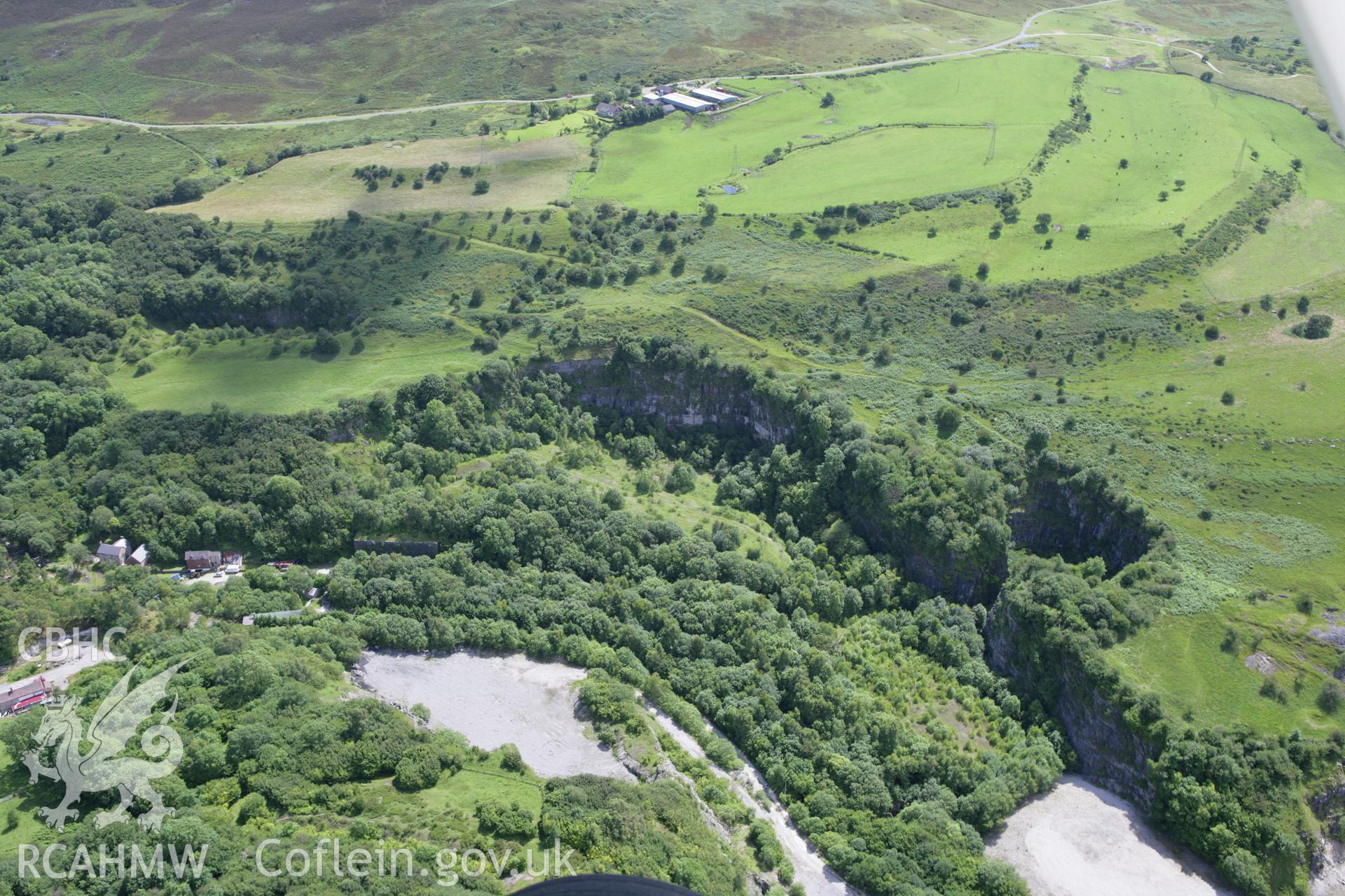 RCAHMW colour oblique aerial photograph of Hoffman Limekiln, Minera Quarry. Taken on 24 July 2007 by Toby Driver