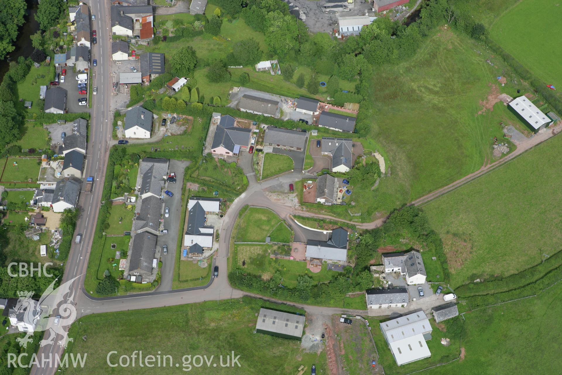 RCAHMW colour oblique aerial photograph of Sennybridge Castle. Taken on 09 July 2007 by Toby Driver