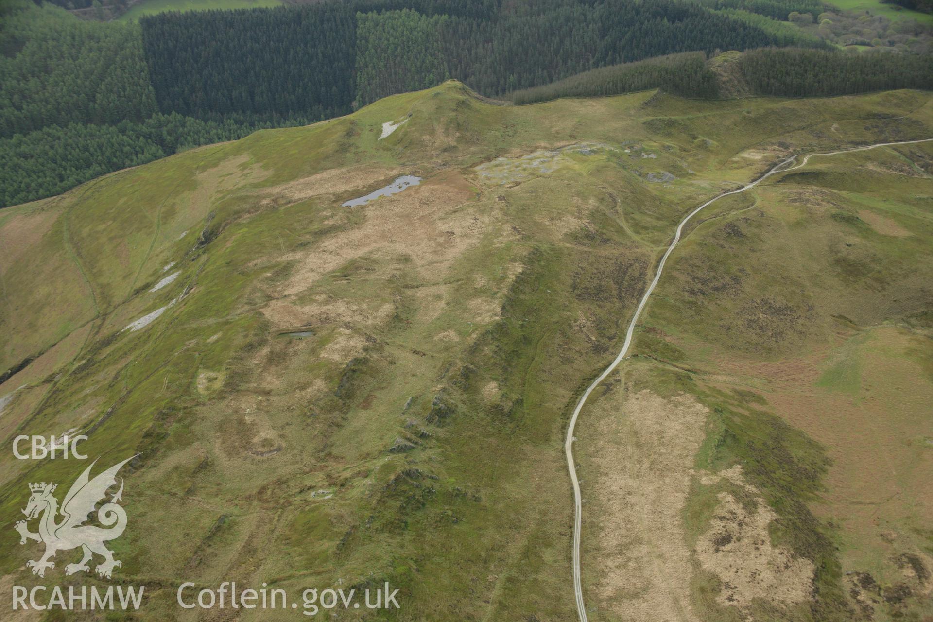 RCAHMW colour oblique aerial photograph of Lluest Pencraig Ddu Deserted Rural Settlement. Taken on 17 April 2007 by Toby Driver