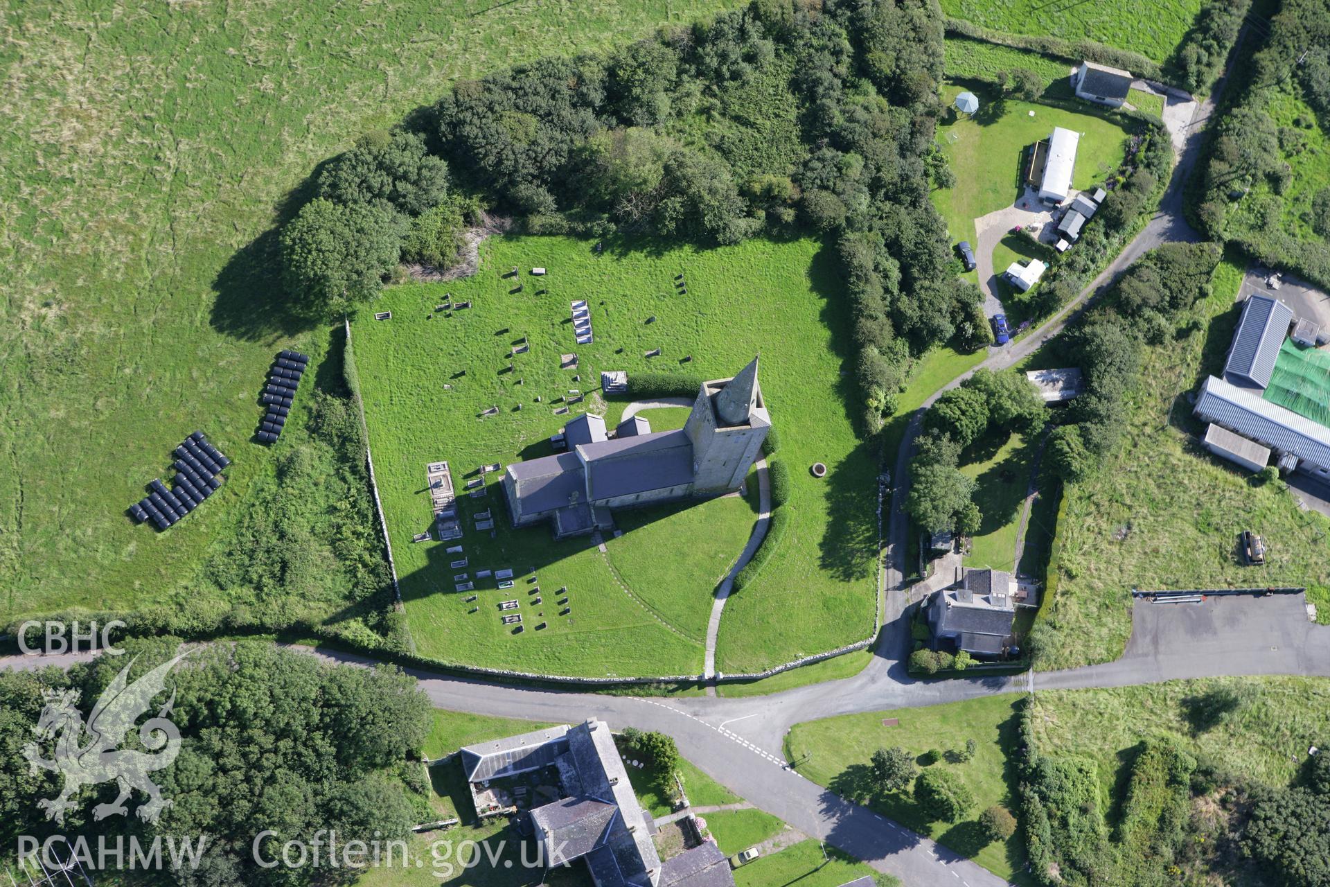 RCAHMW colour oblique aerial photograph of St Mary's Church, Warren. Taken on 30 July 2007 by Toby Driver