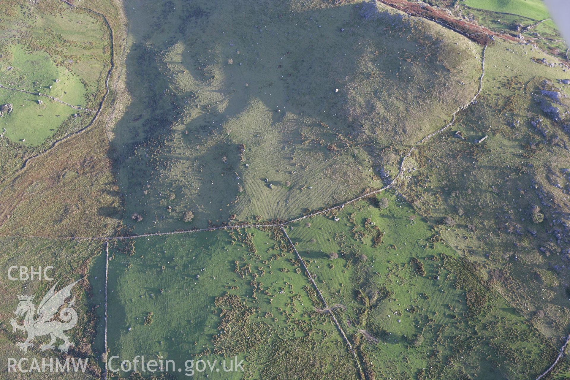 RCAHMW colour oblique aerial photograph of the remains of a settlement and traces of cultivation at Craig-y-Gesail. Taken on 06 September 2007 by Toby Driver