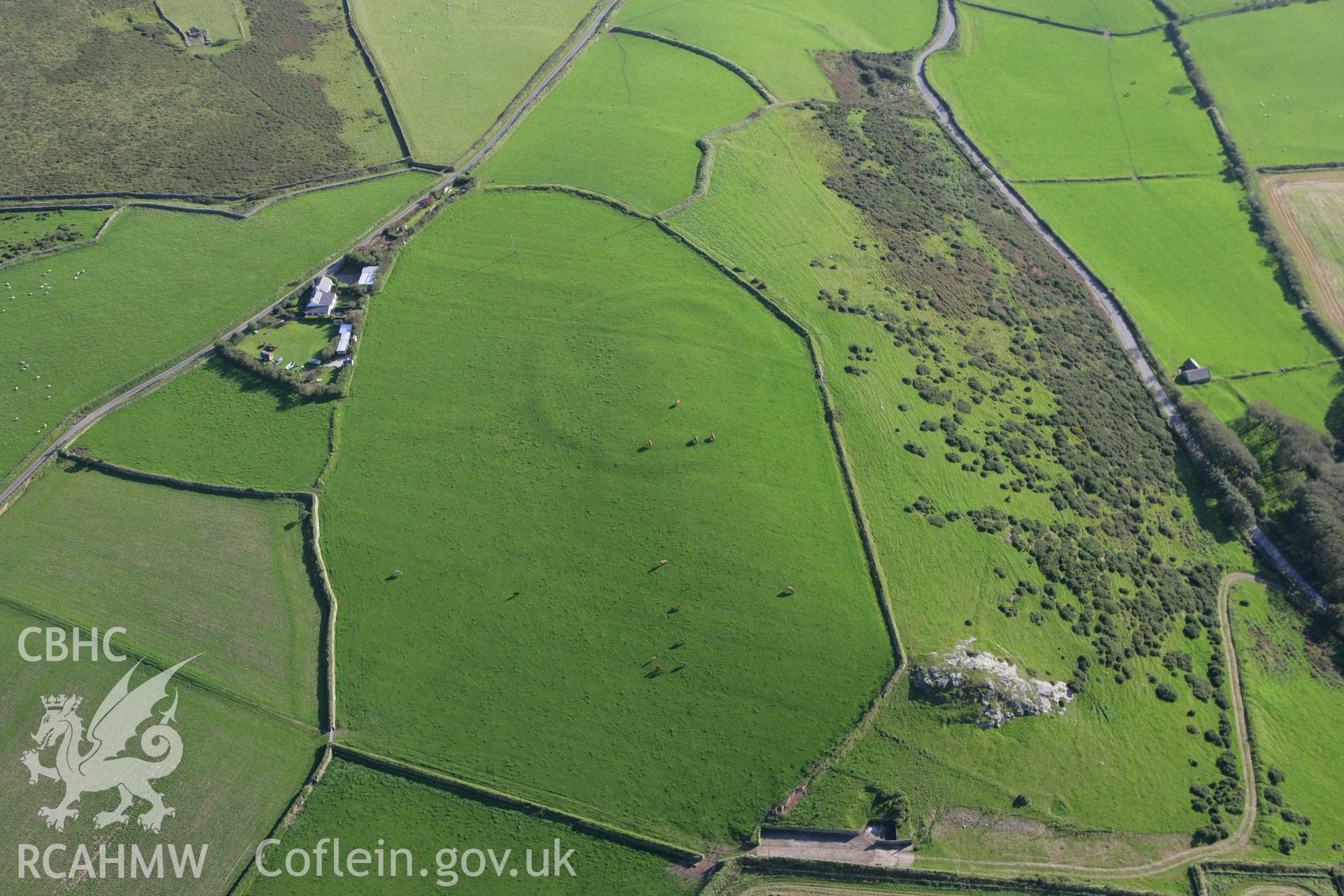 RCAHMW colour oblique aerial photograph of Meillionydd Enclosure. Taken on 06 September 2007 by Toby Driver