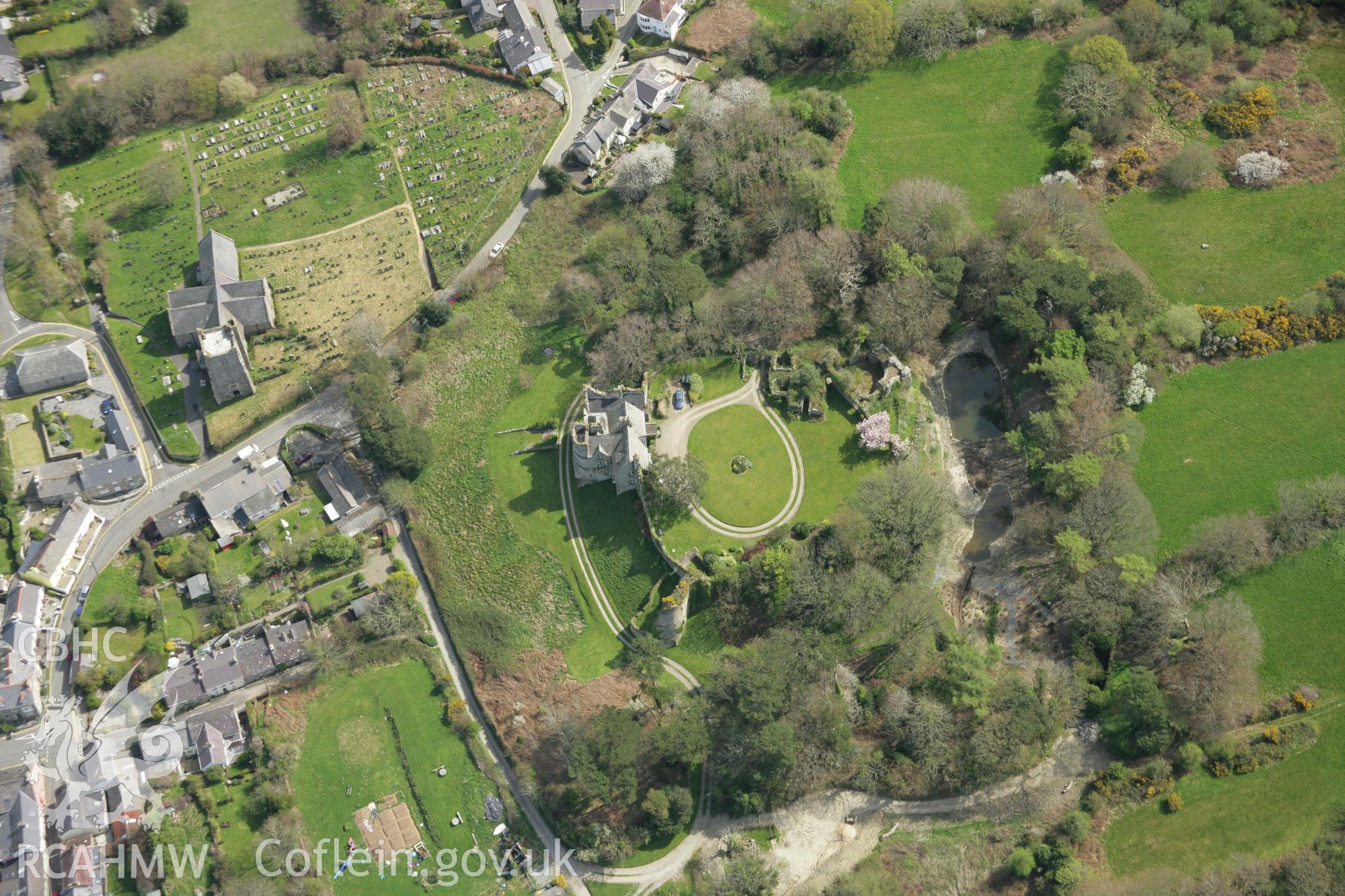 RCAHMW colour oblique aerial photograph of Newport Castle, Pembrokeshire. Taken on 17 April 2007 by Toby Driver