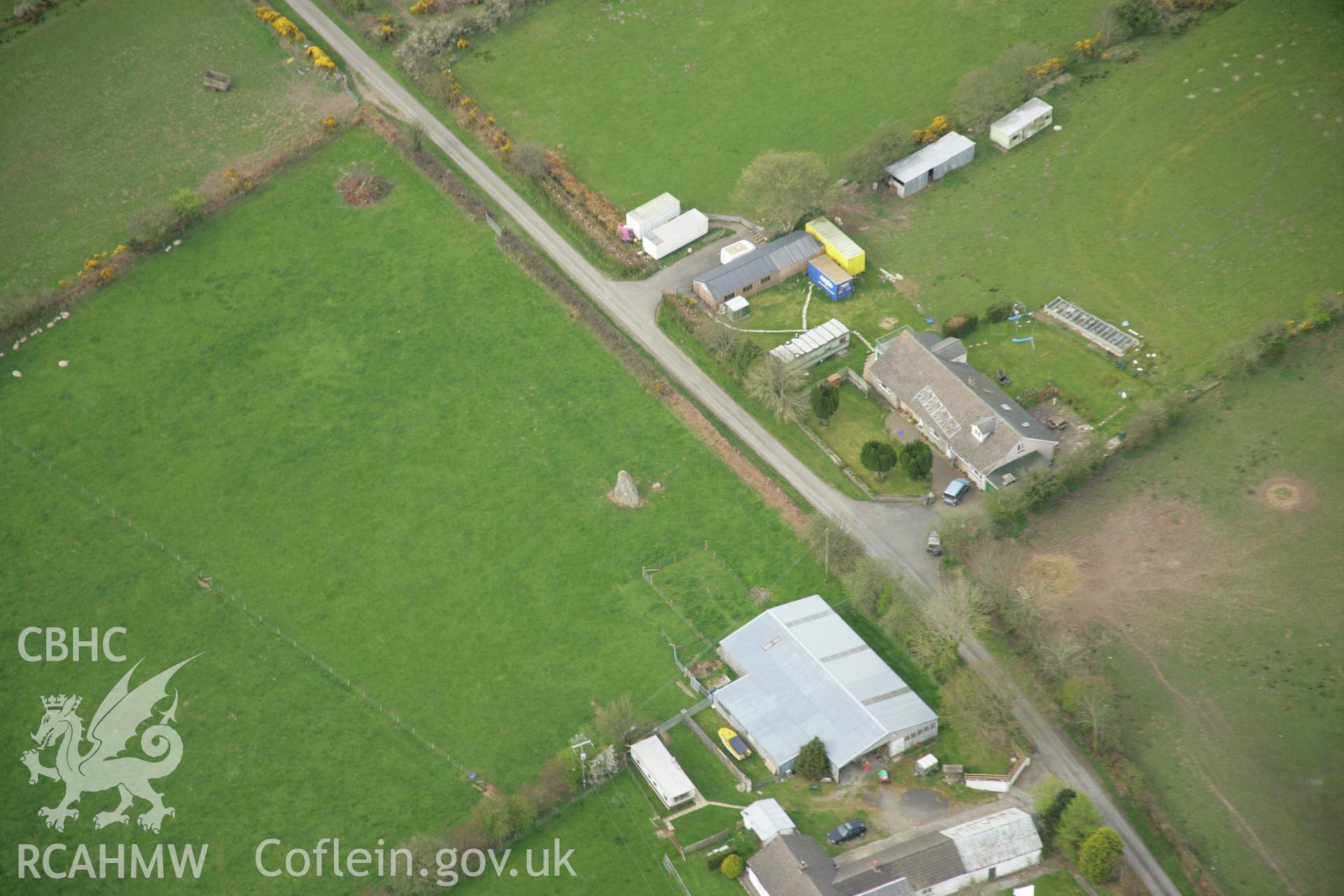 RCAHMW colour oblique aerial photograph of standing stone at Llech Gron. Taken on 17 April 2007 by Toby Driver