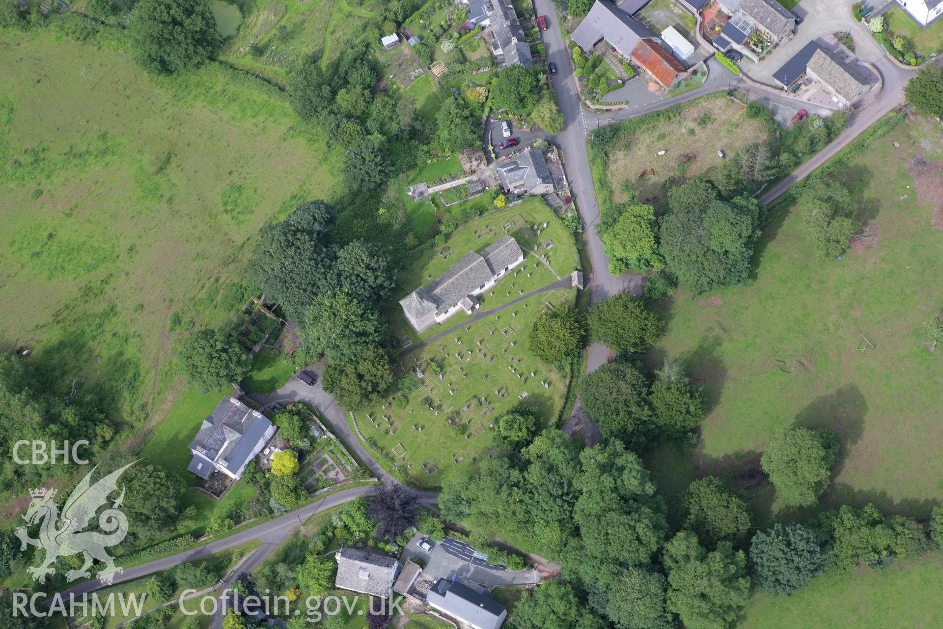 RCAHMW colour oblique aerial photograph of Llanfilo Moat II. Taken on 09 July 2007 by Toby Driver