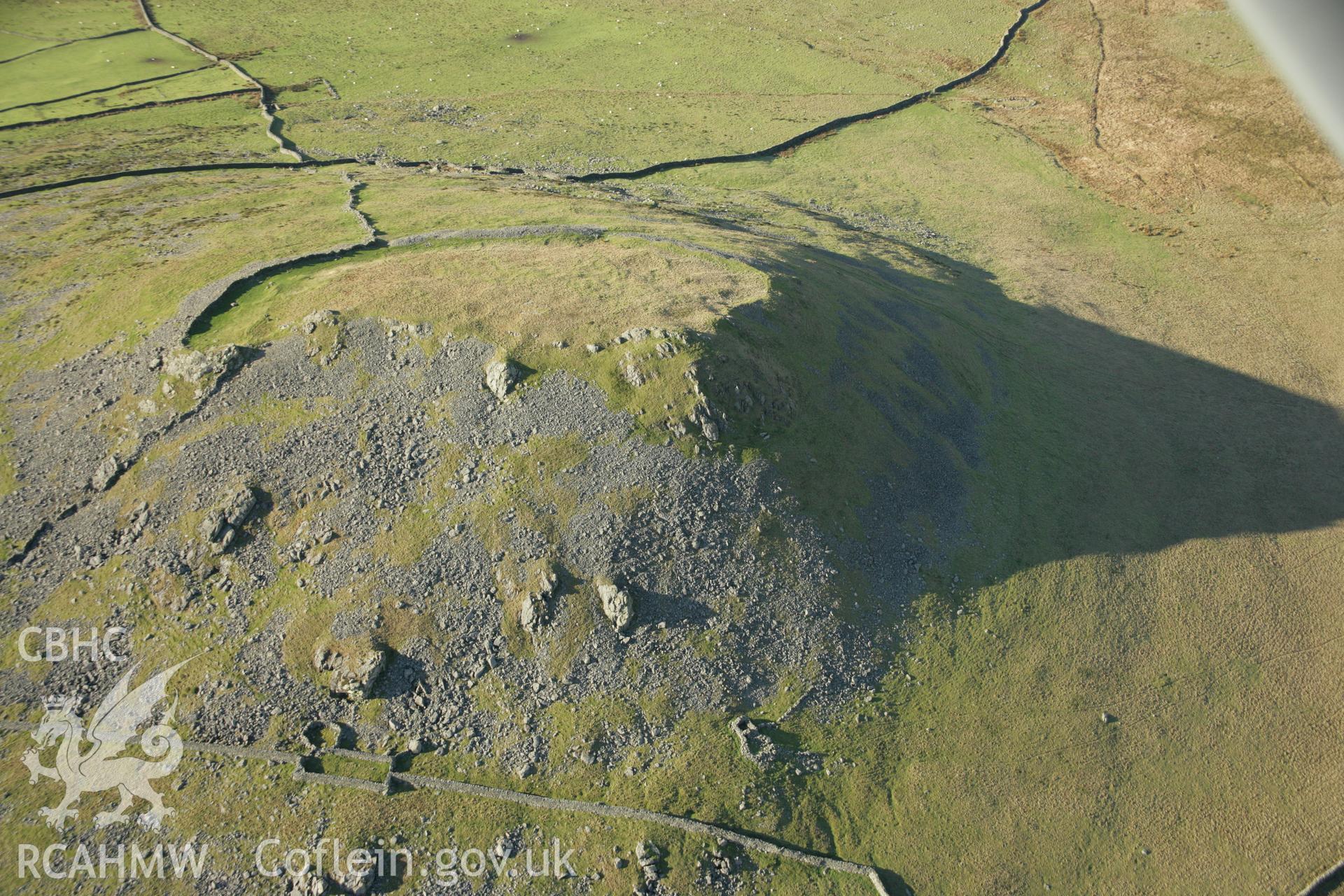 RCAHMW colour oblique aerial photograph of Pen-y-Gaer, with view of Camp. Taken on 25 January 2007 by Toby Driver