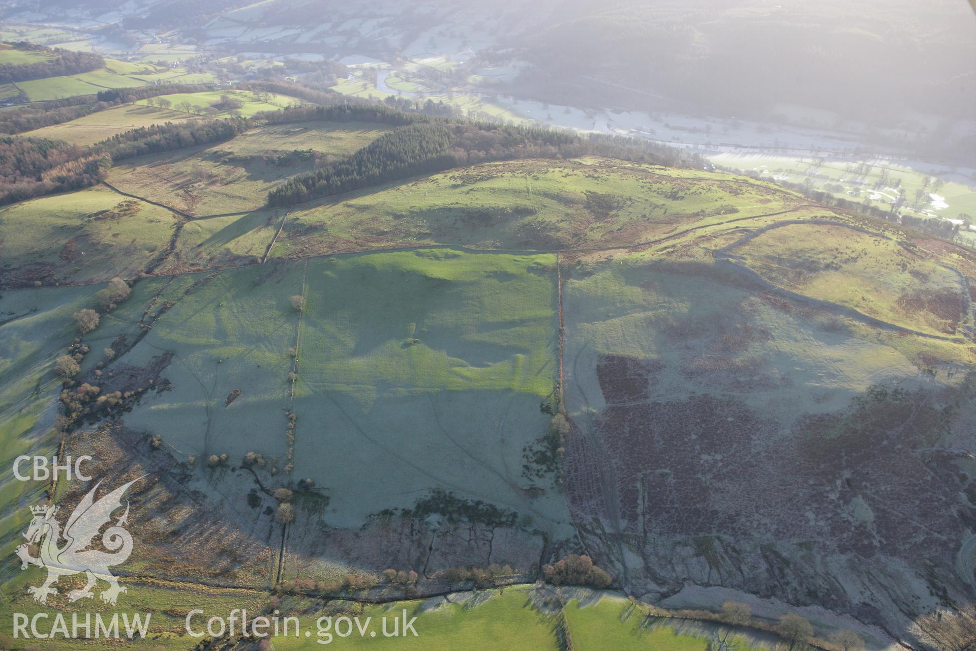 RCAHMW colour oblique photograph of Caer Drewyn, settlement and field system. Taken by Toby Driver on 11/12/2007.