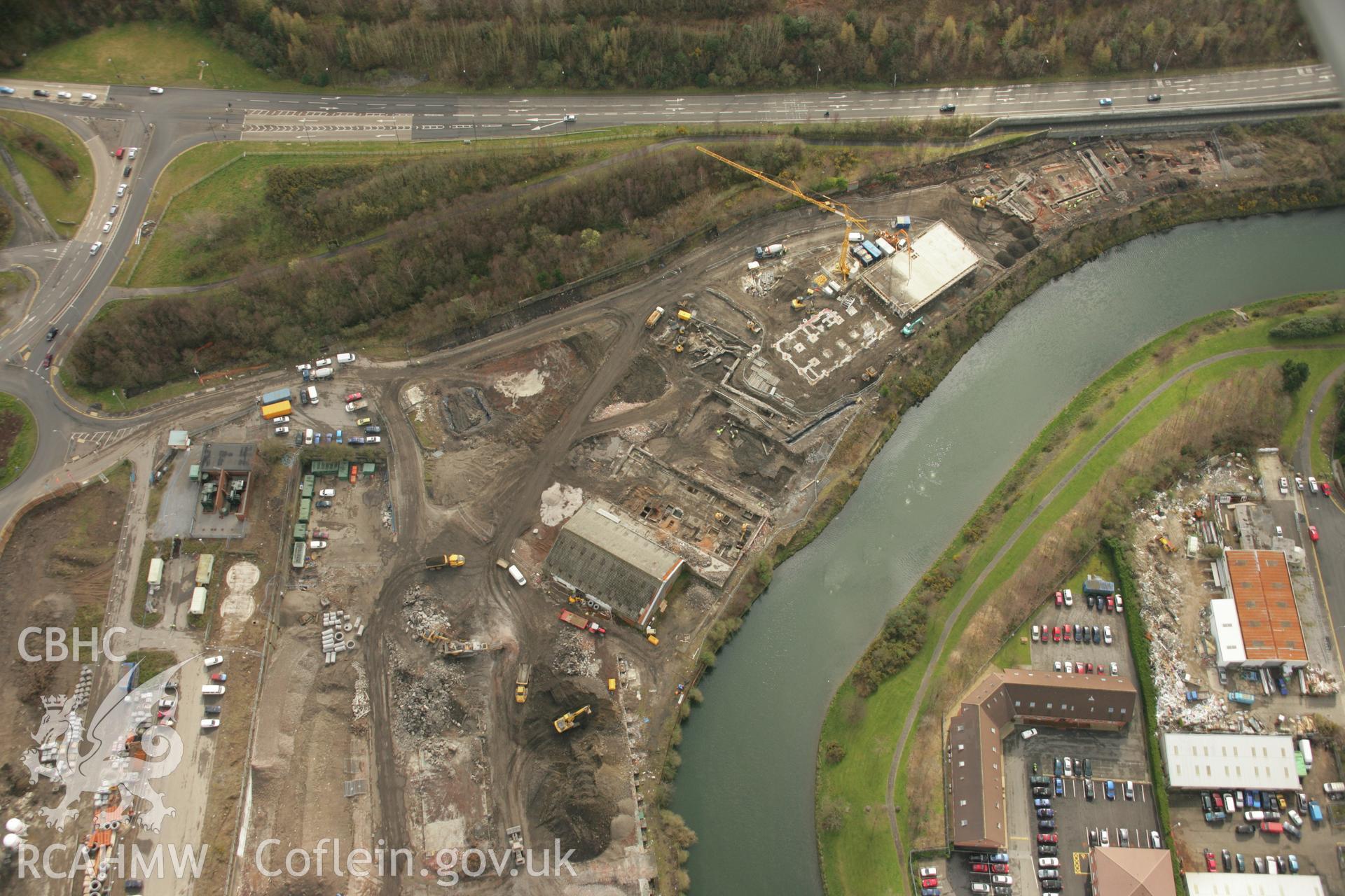 RCAHMW colour oblique aerial photograph of Upper Bank Copperworks, Swansea, showing excavations. Taken on 16 March 2007 by Toby Driver